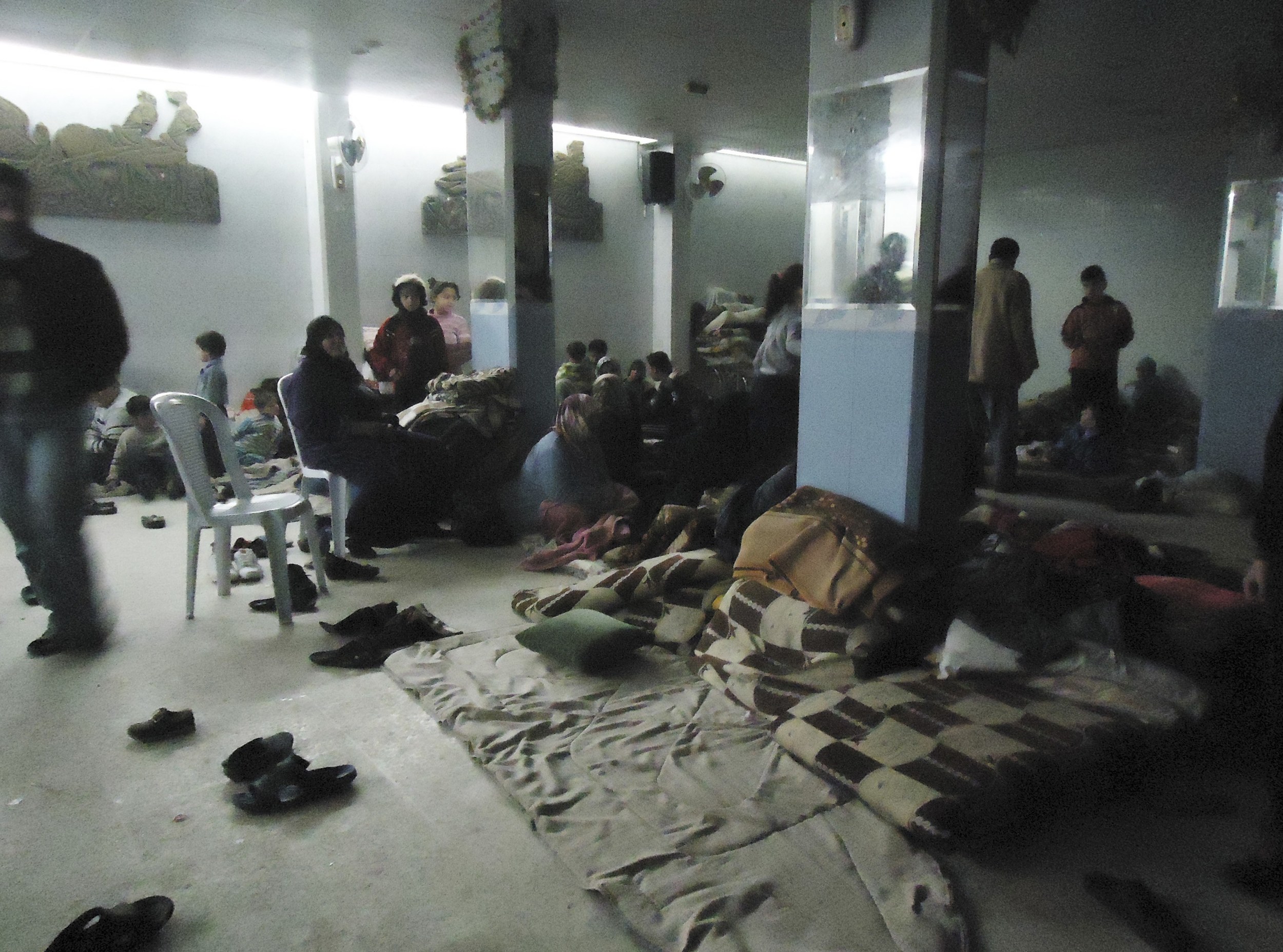 Syrian civilians bear brunt of violence - Shelter in Baba Amro, near Homs Photo courtesy of Reuters/Mulham Alnader