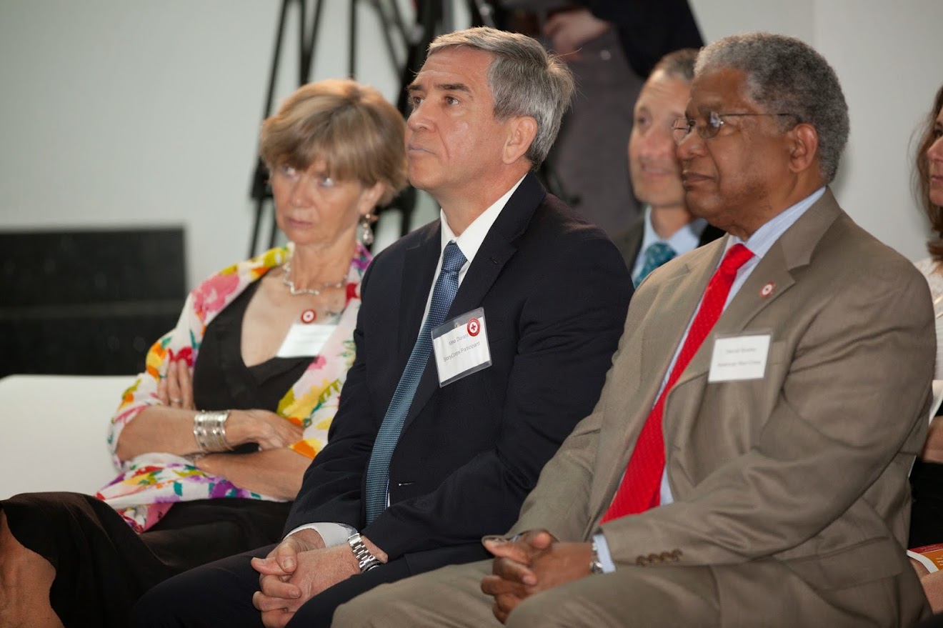 Former ICRC Delegate, Suzanne Hofstetter (left), sits next to Mike Durant, whom she visited in Mogadishu in 1993 after his Black Hawk helicopter was shot down and he was taken as a POW. They are seated next to Harold Brooks (right), Senior Vice President of International Operations at the American Red Cross. 