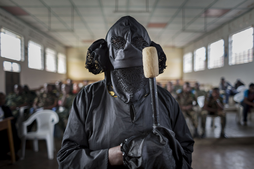 Democratic Republic of the Congo - A victim, veiled to protect her identity, testifies in court. On a November evening in 2012, FARDC soldiers pillage her home and raped her. When her husband learned she had been raped, he l eft. He never returned.