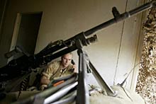 Iraq, 2004. Traditional military functions are increasingly being outsourced to private contractors ©Reuters 