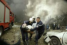 Algeria, 2007. Firemen evacuate a victim of a suicide car bomb. ©Reuters/L. Larbi 