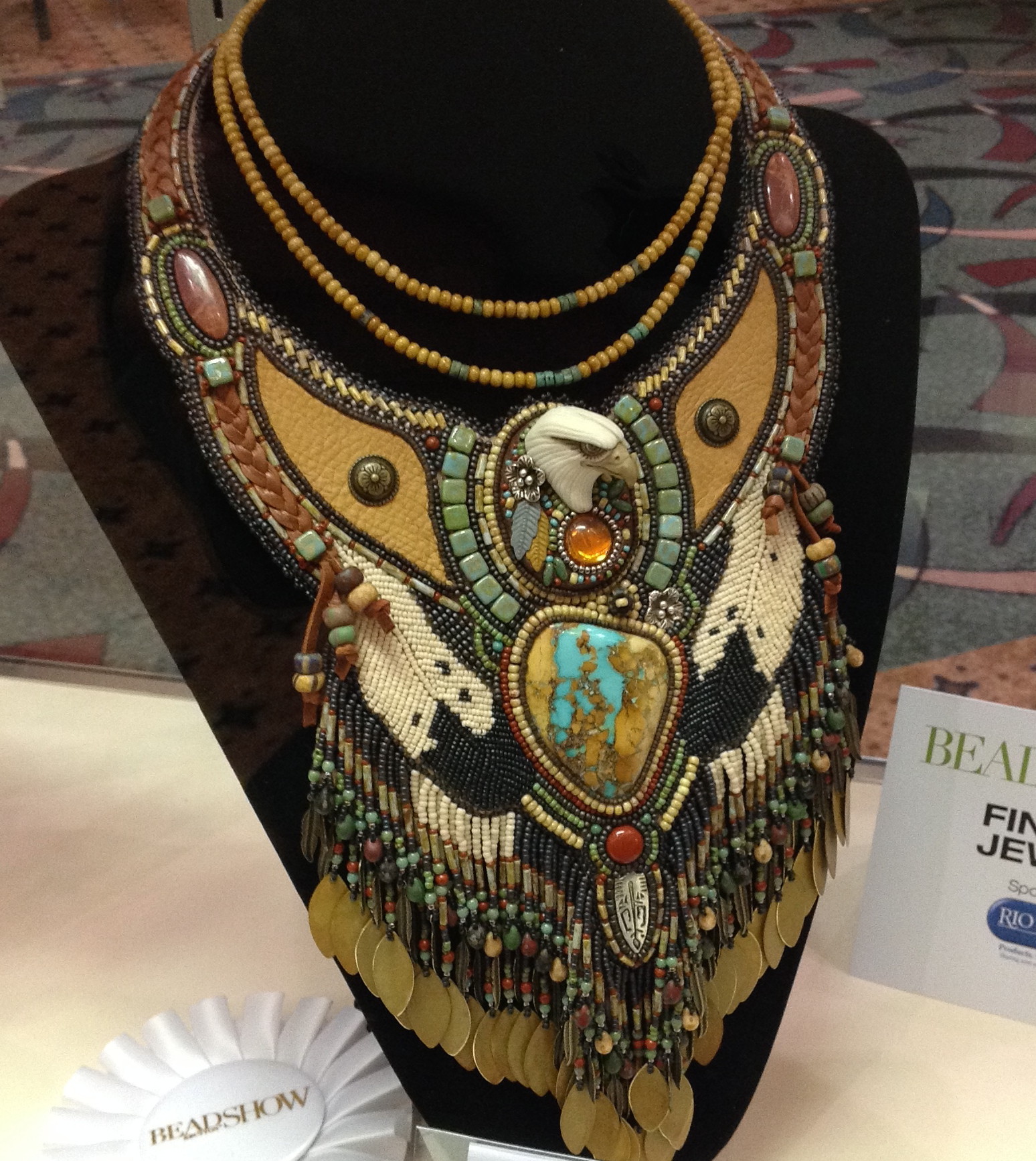 This piece was created by Sue Horine who is known for her large breast plate style necklaces. I believe the piece took a first place in it's category.