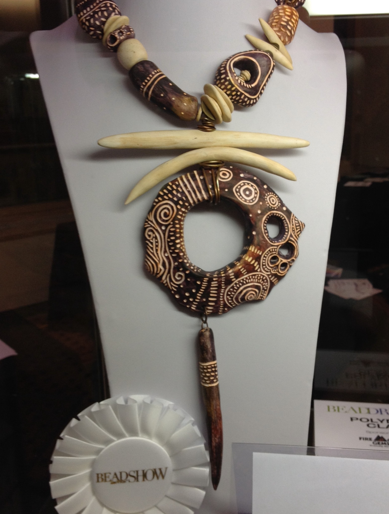 This is one of my favorite polymer artists, Stacy Smith. I believe this piece won first place in it's category.