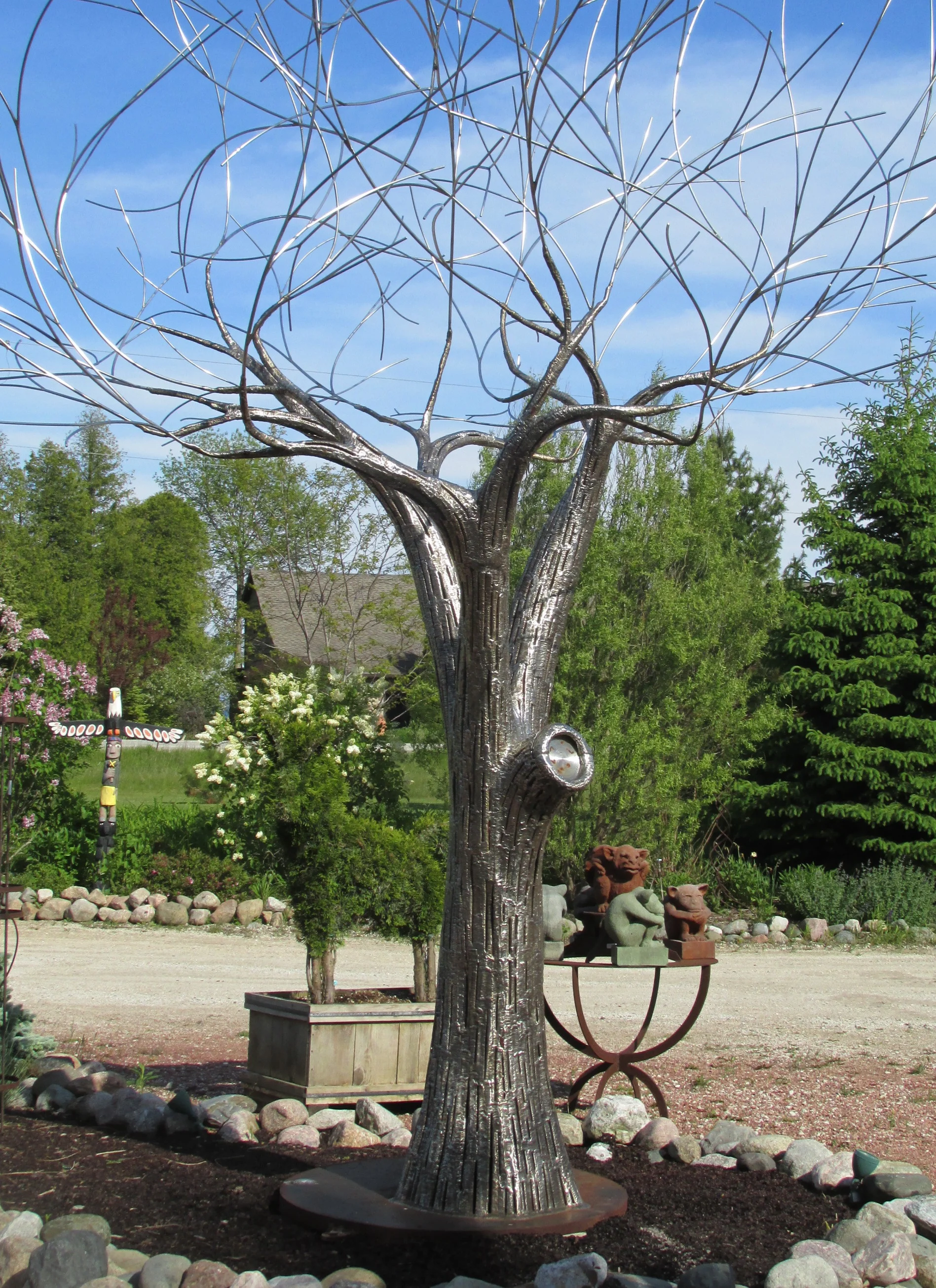 Very well done full size metal tree sculpture. I'll bet this piece even looks good in the winter with the snow!