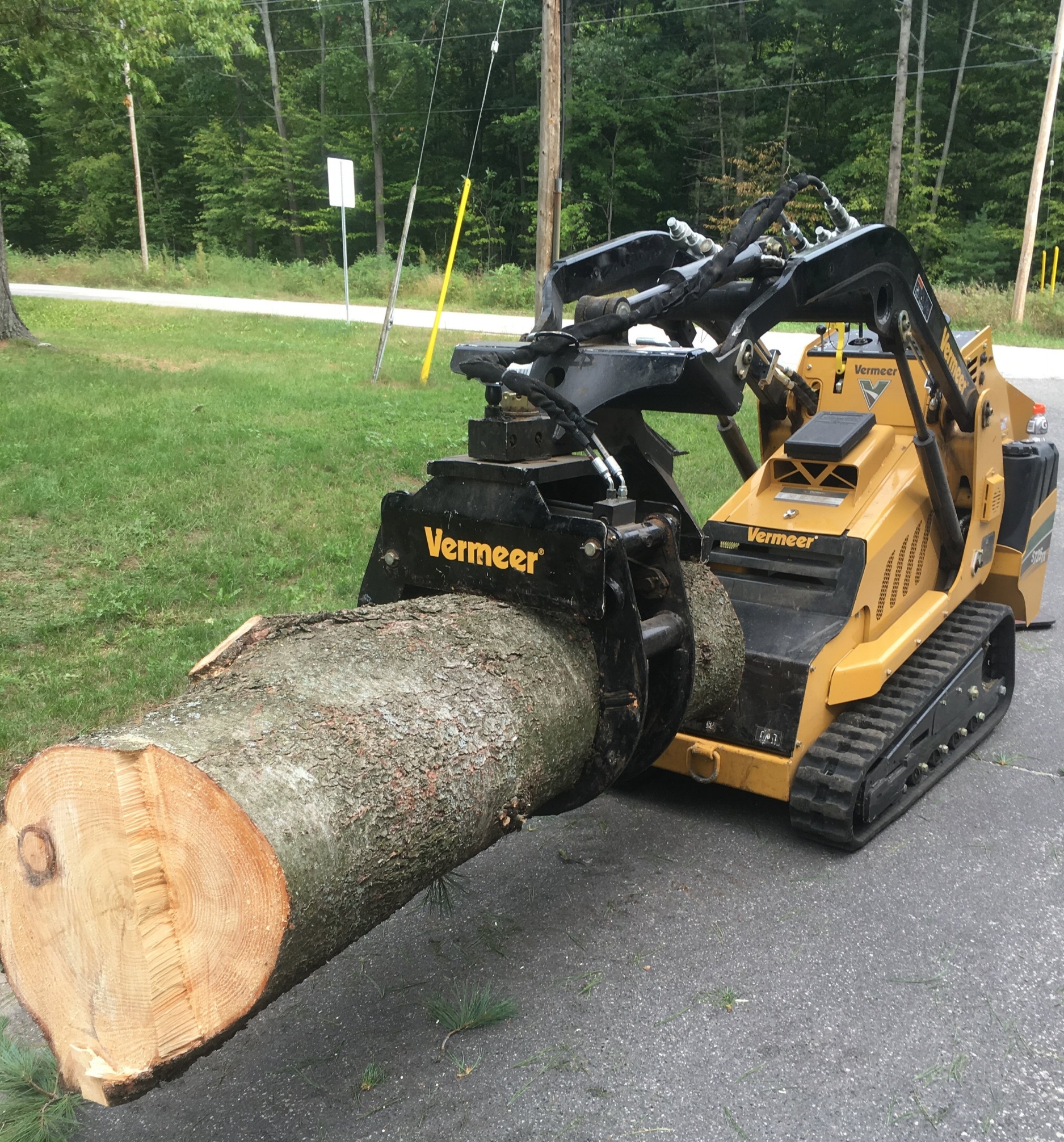 Vermeer S725TX Skid Steer with Log Grapple