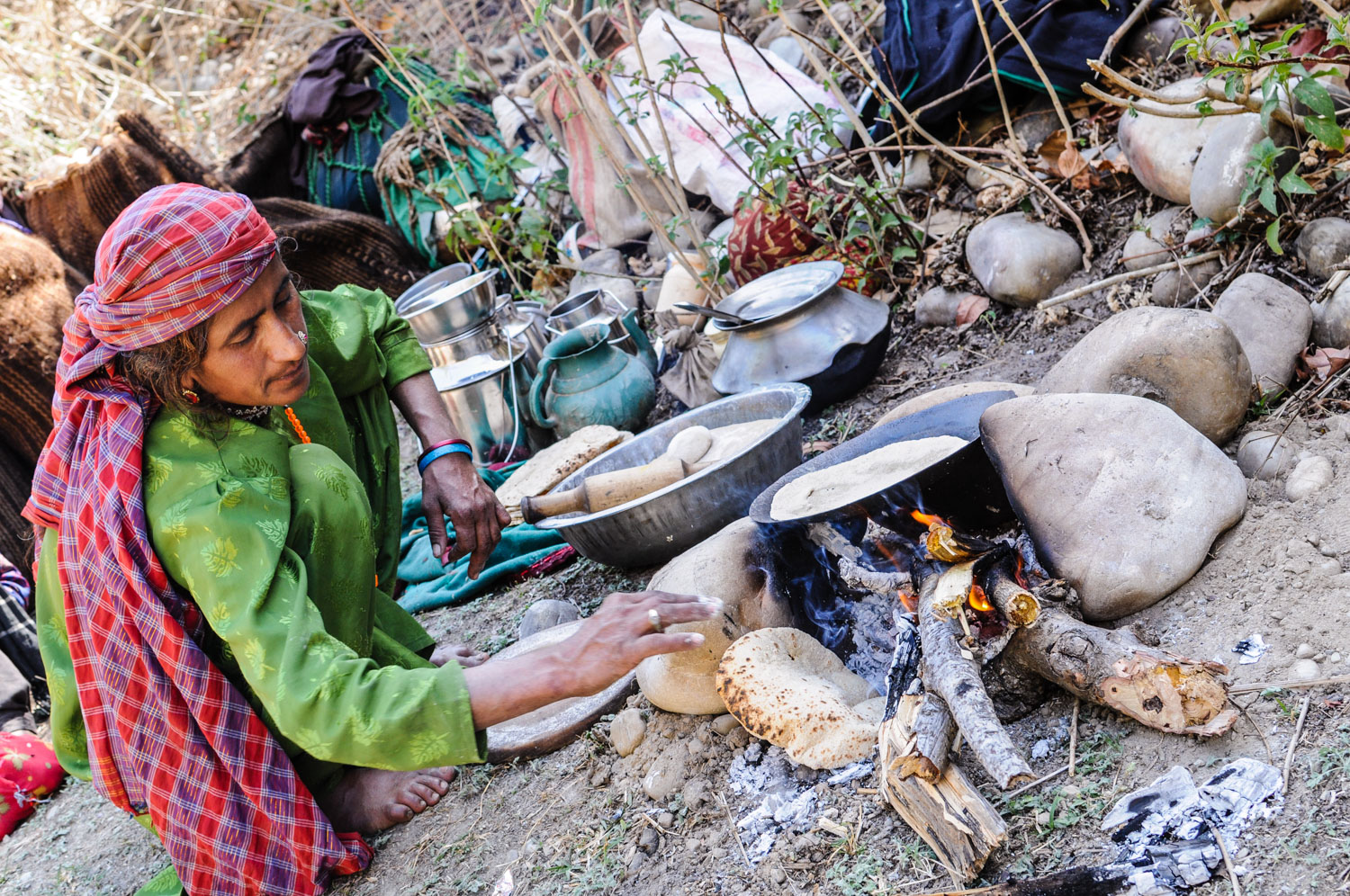 Jamila cooking chapattis at the first camp
