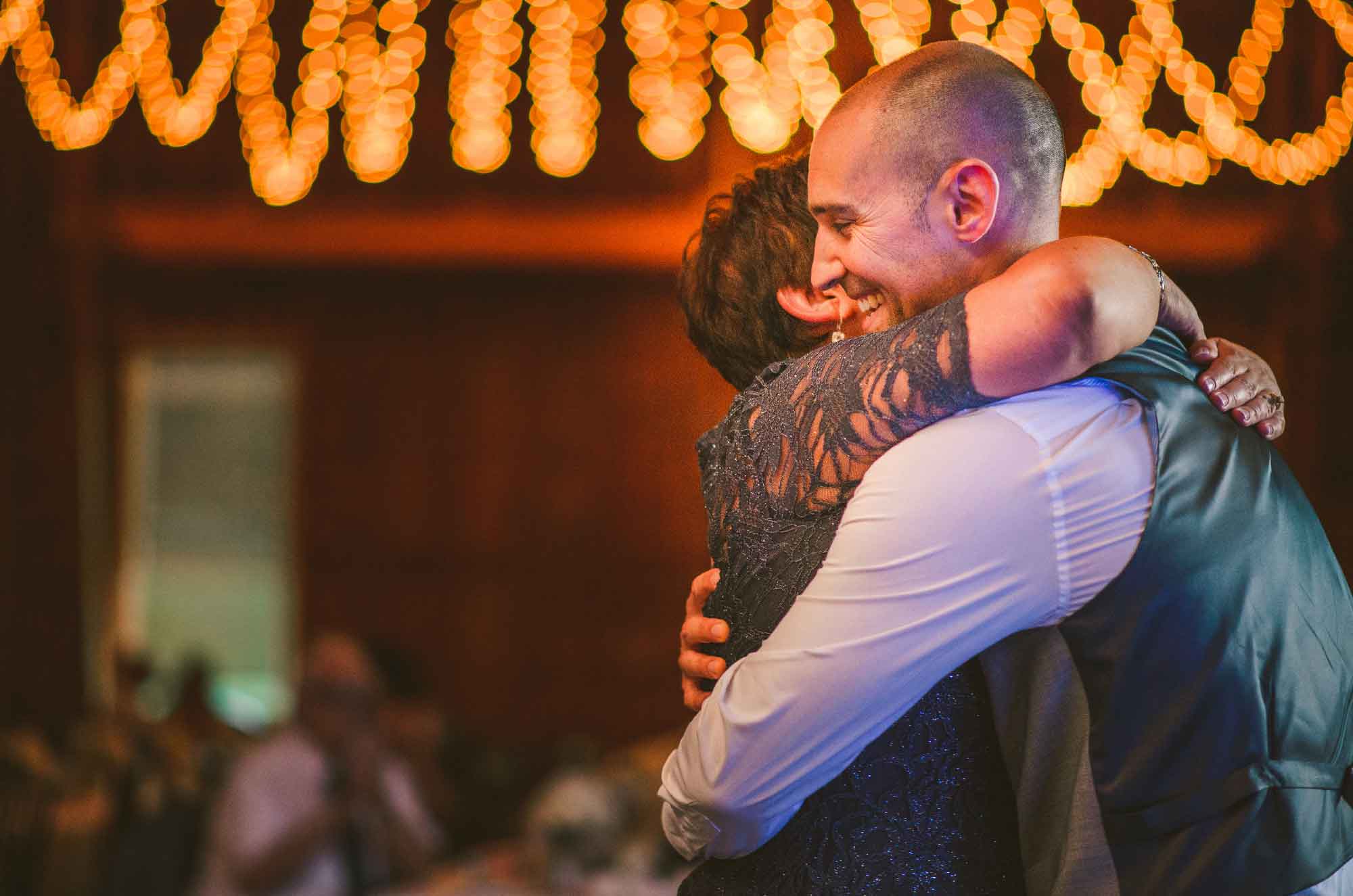 29-wedding-reception-mother-son-hug.jpg