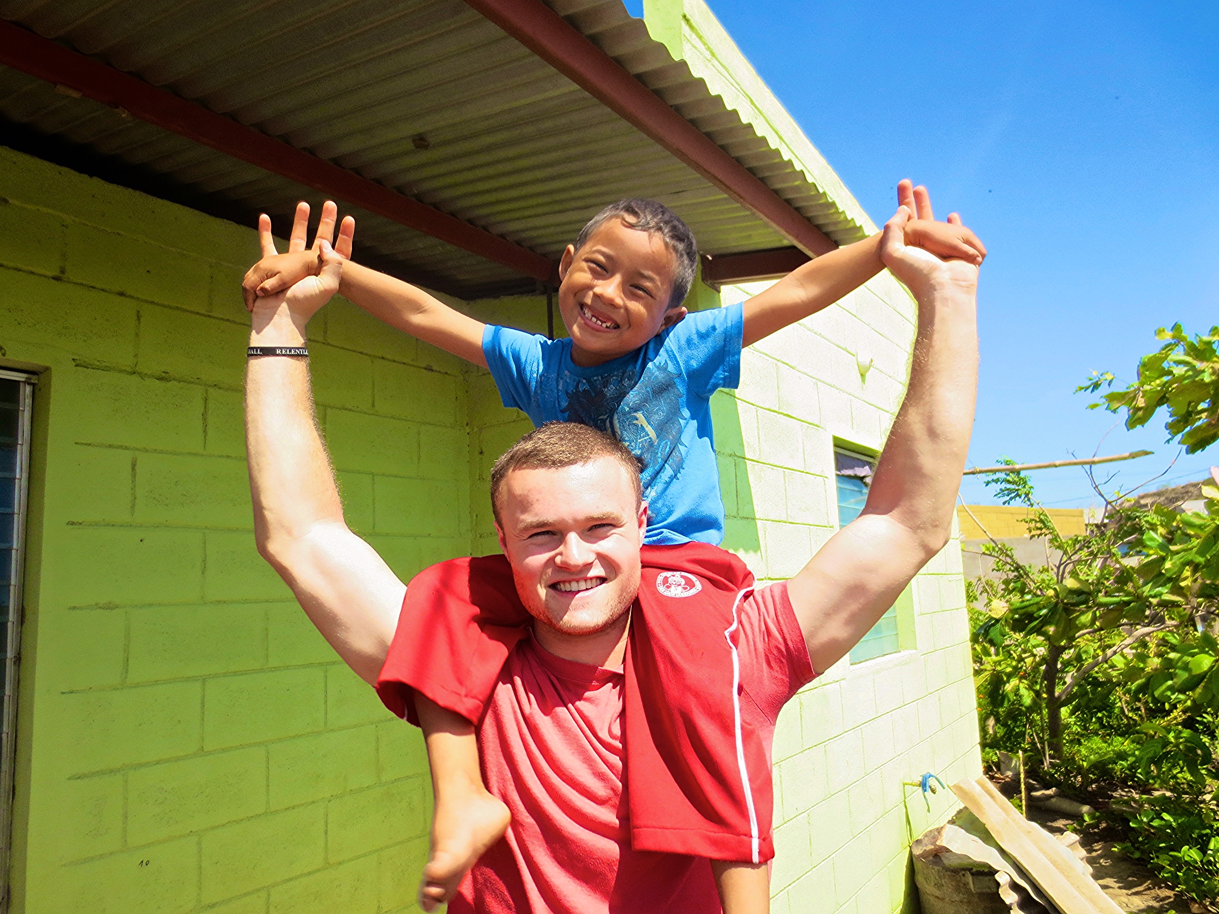 Gretchen Website Nicaragua Volunteer with Kid.JPG
