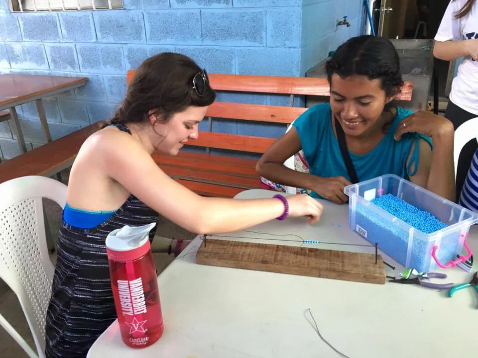 The students from Vanderbilt not only created a marketing scheme for Camino Nuevo, but also learned how to make the pieces in our collection from the women themselves!