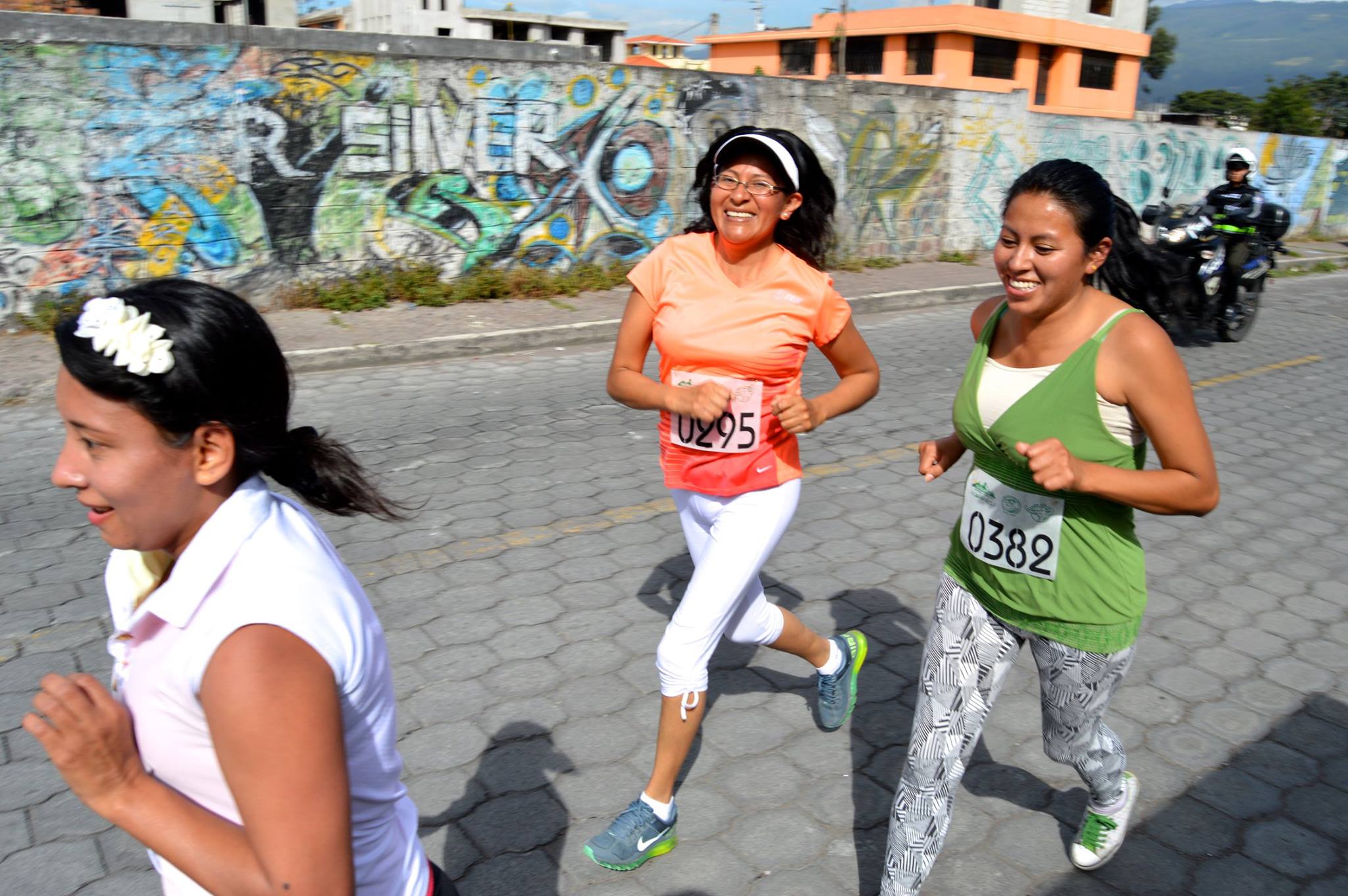 Ecuador 5K 2015 Ladies Running with Police Escort 2.jpg