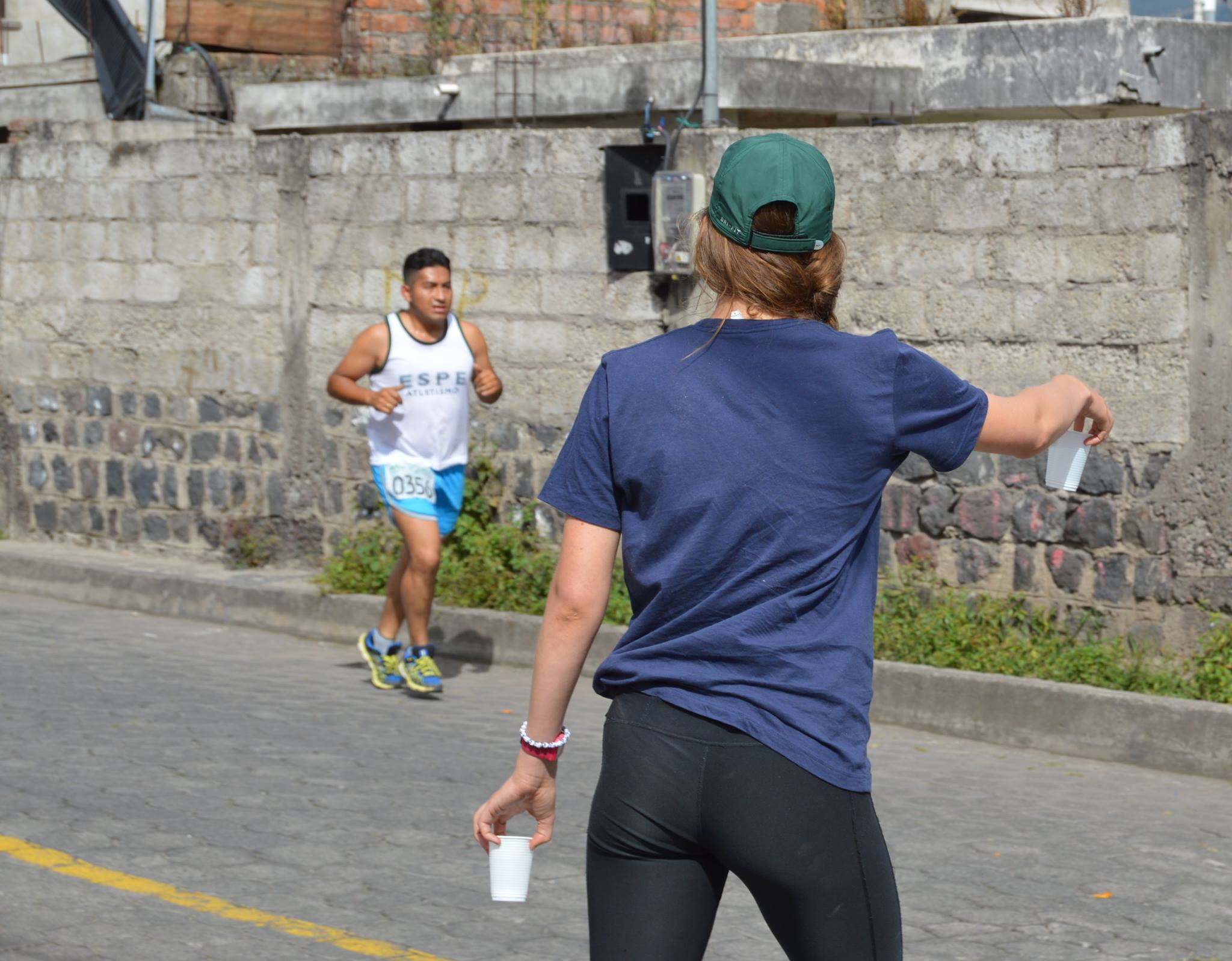 Ecuador 5K 2015 Volunteer Gives Water.jpg