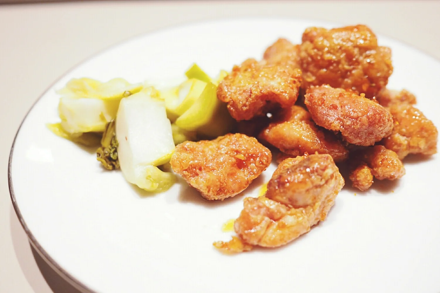 crispy sweetbreads with fish sauce glaze, pickled chinese mustard greens.
