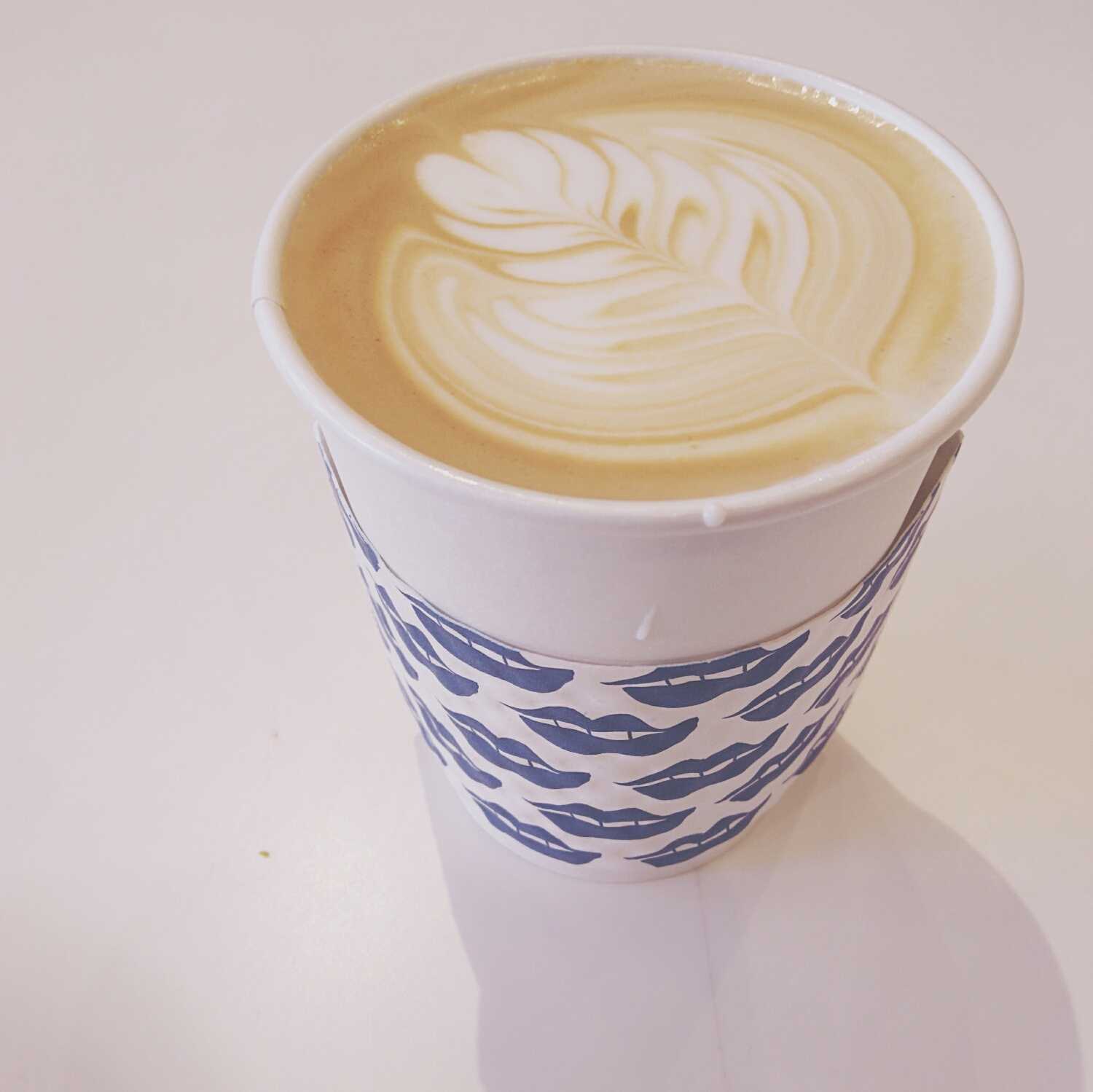 expertly poured latte.