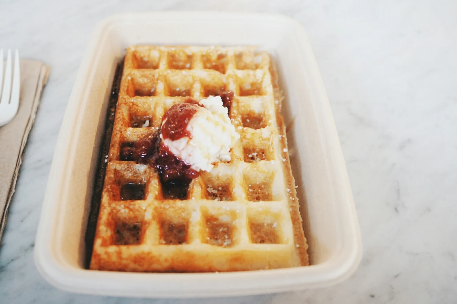 yeast waffle with ricotta, jam and honey.
