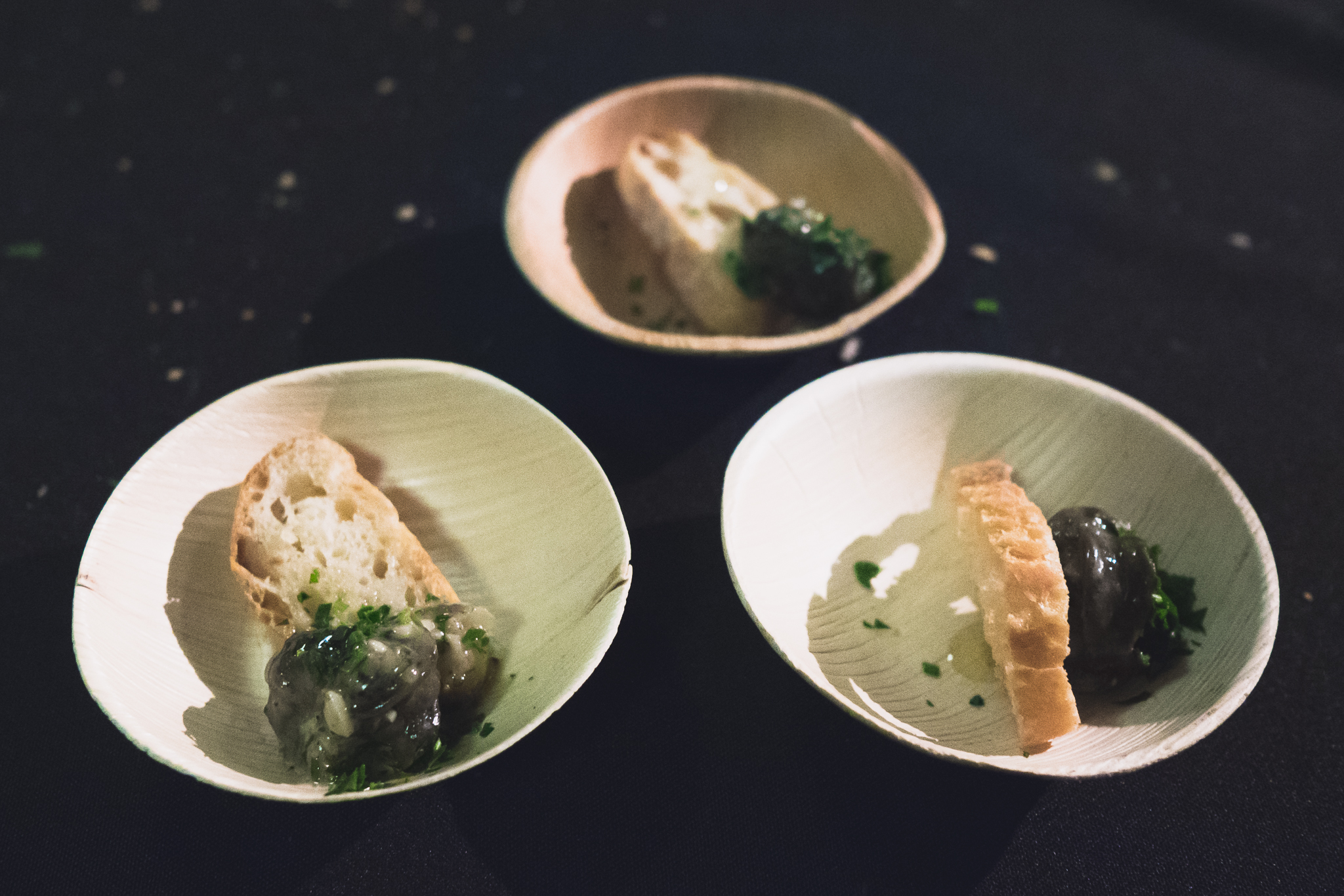 petit trois's burgundy escargots with garlic and parsley butter.