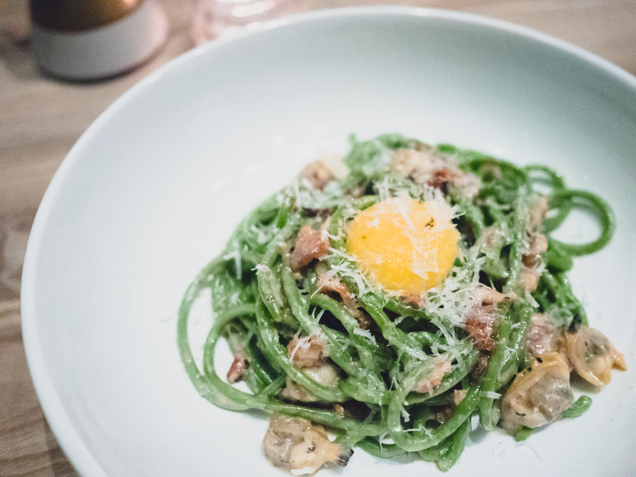 spinach bucatini with egg, bacon, clam, creme fraiche.