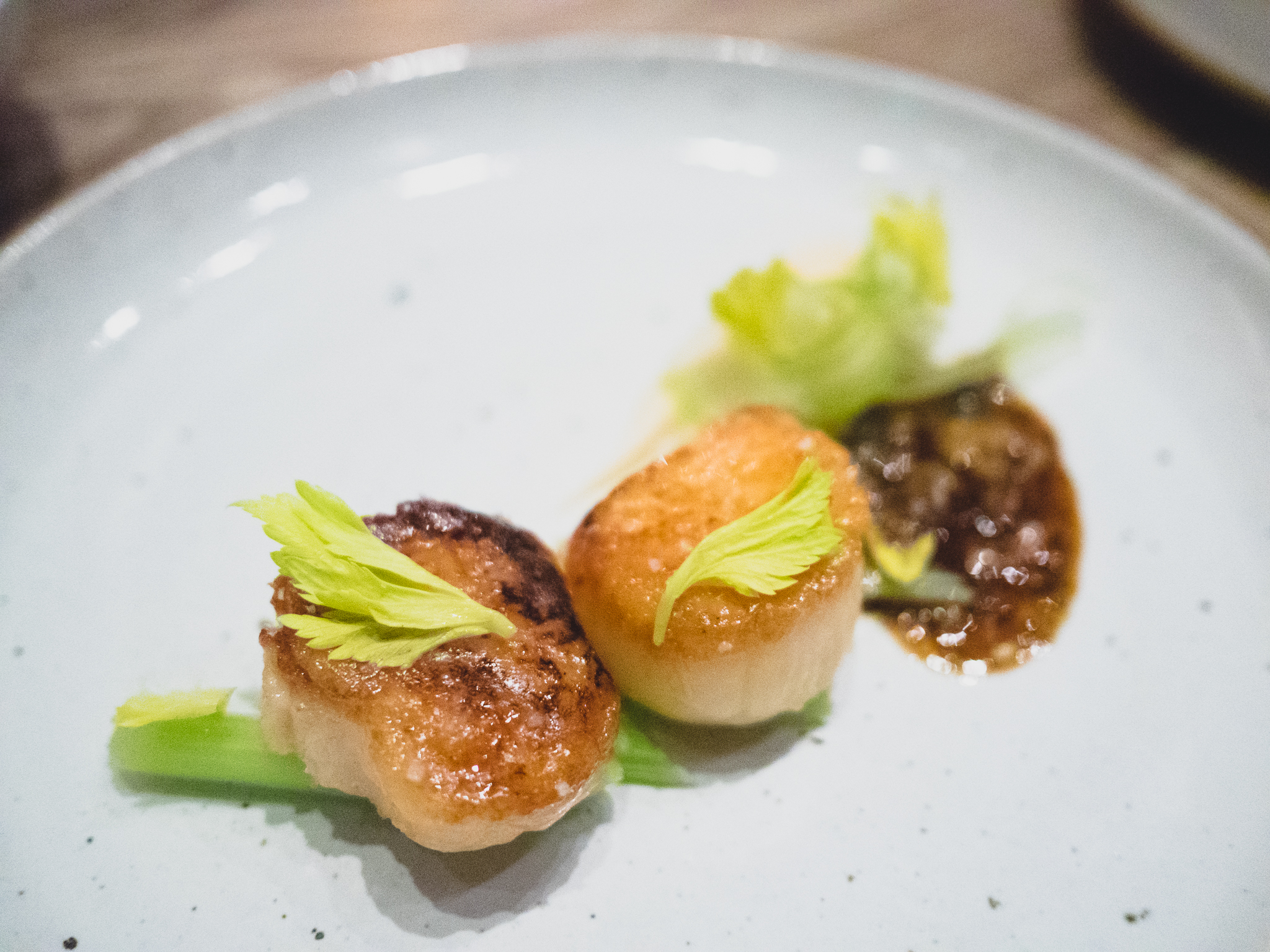 scallop with bone marrow vinaigrette, celeriac, celery.