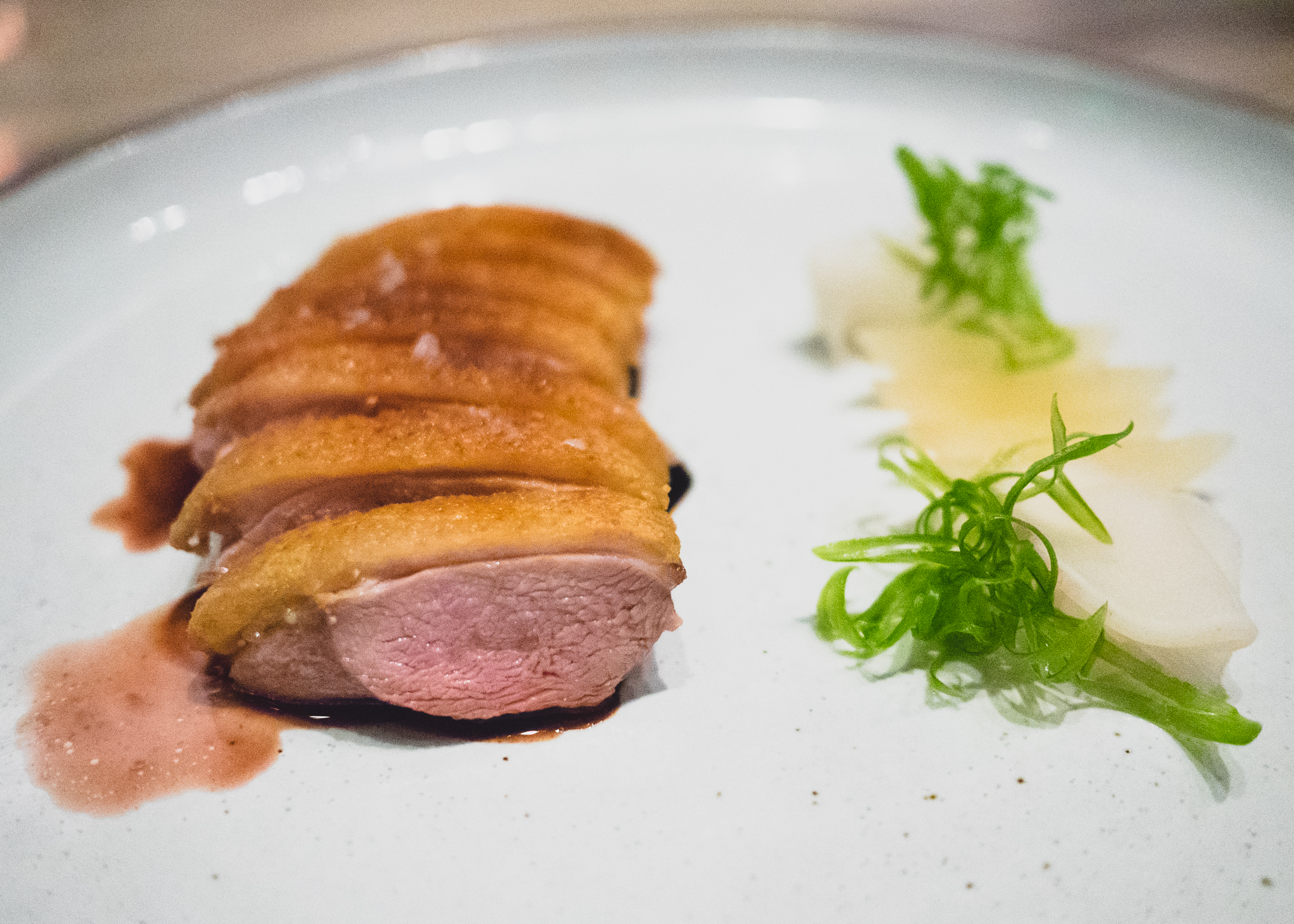duck with pear, chocolate, turnip, onions.