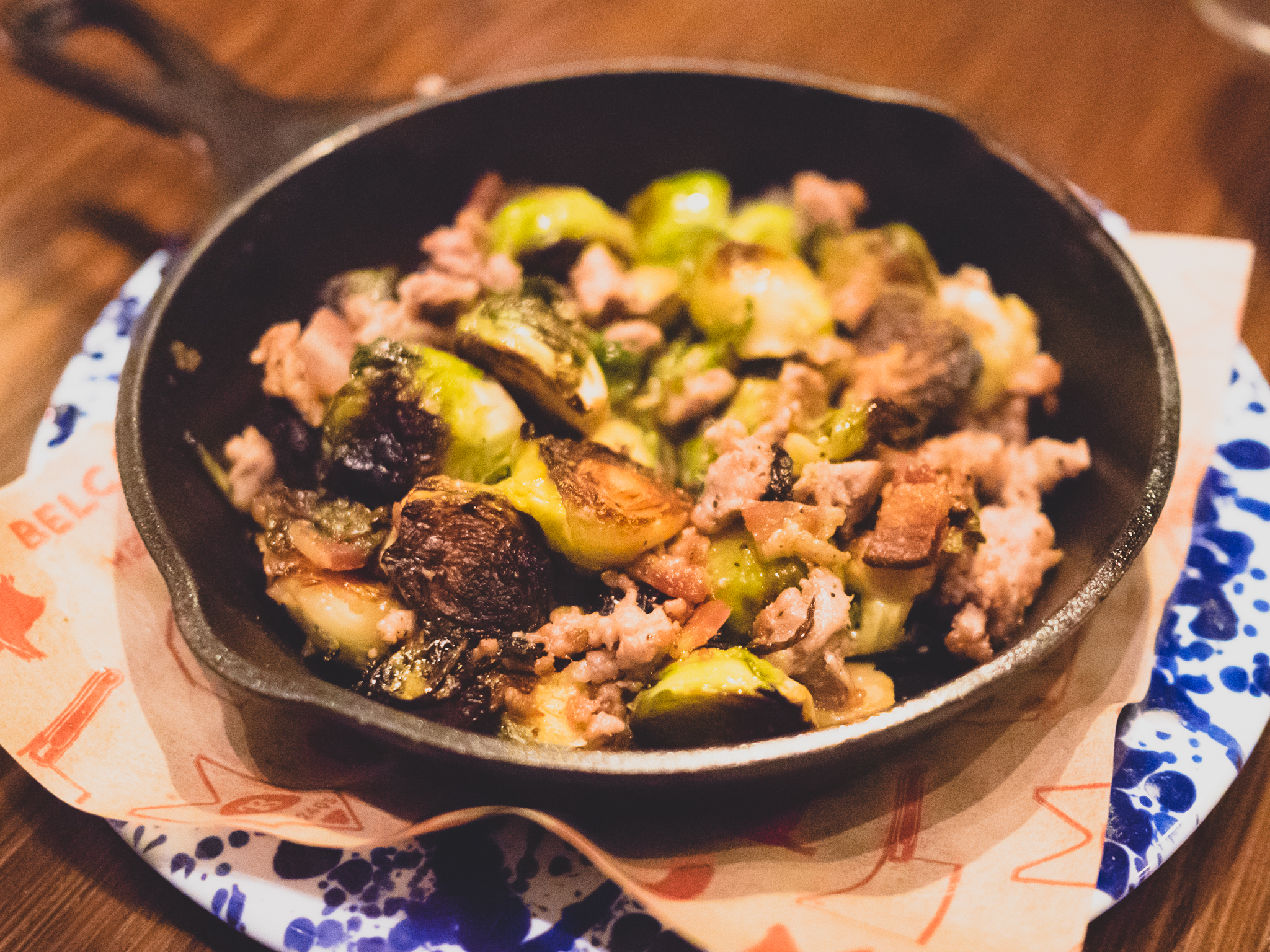 roasted brussels sprouts with sage sausage, bacon, maple syrup and rye whiskey.