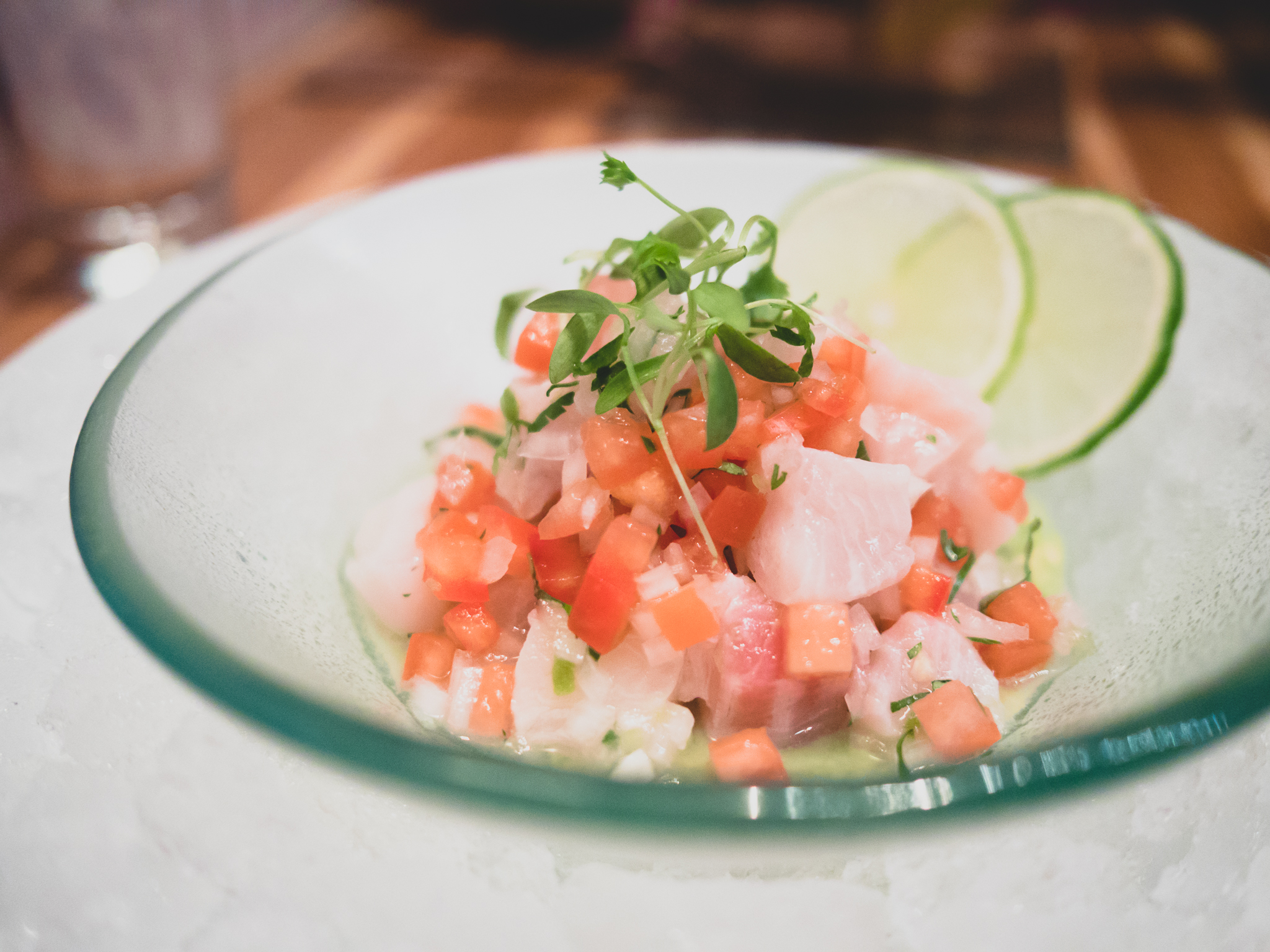 ceviche de peje sol : cured sunfish with serrano chiles, tomato, lime.
