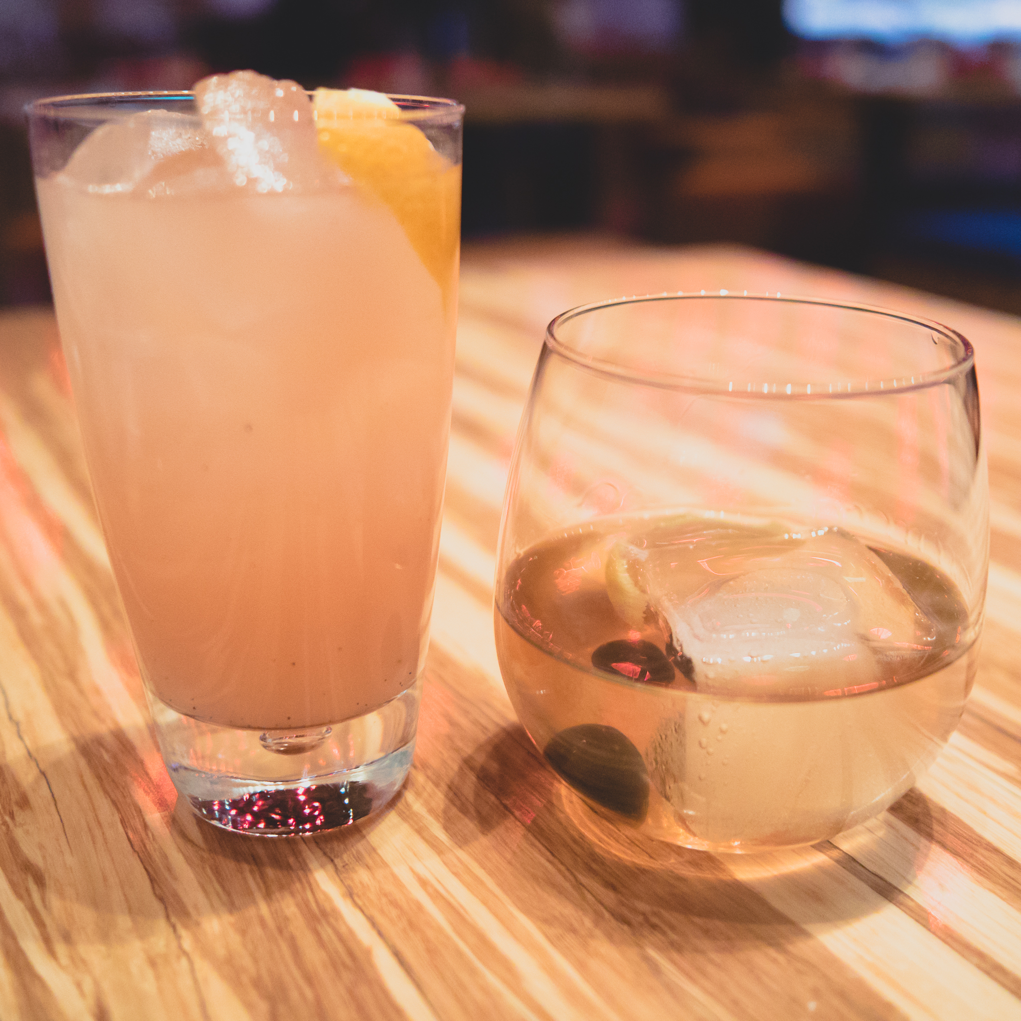 yuzu punch (bourbon, vanilla syrup, grapefruit and yuzu) and oaxacan old fashioned (mezcal, tequila reposado, agave, brandied cherries).