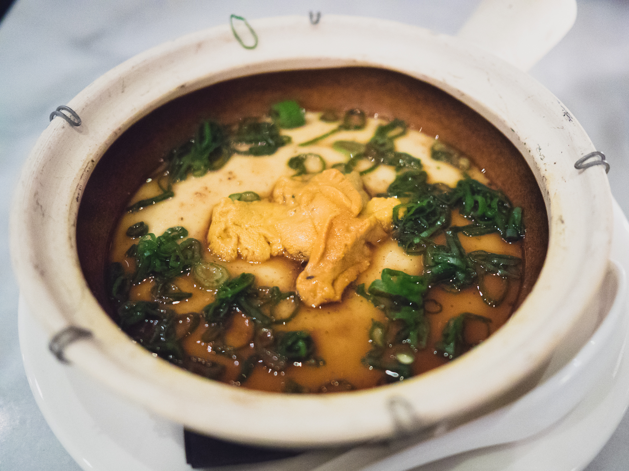 chino valley egg custard with sea urchin roe and braised mushrooms.
