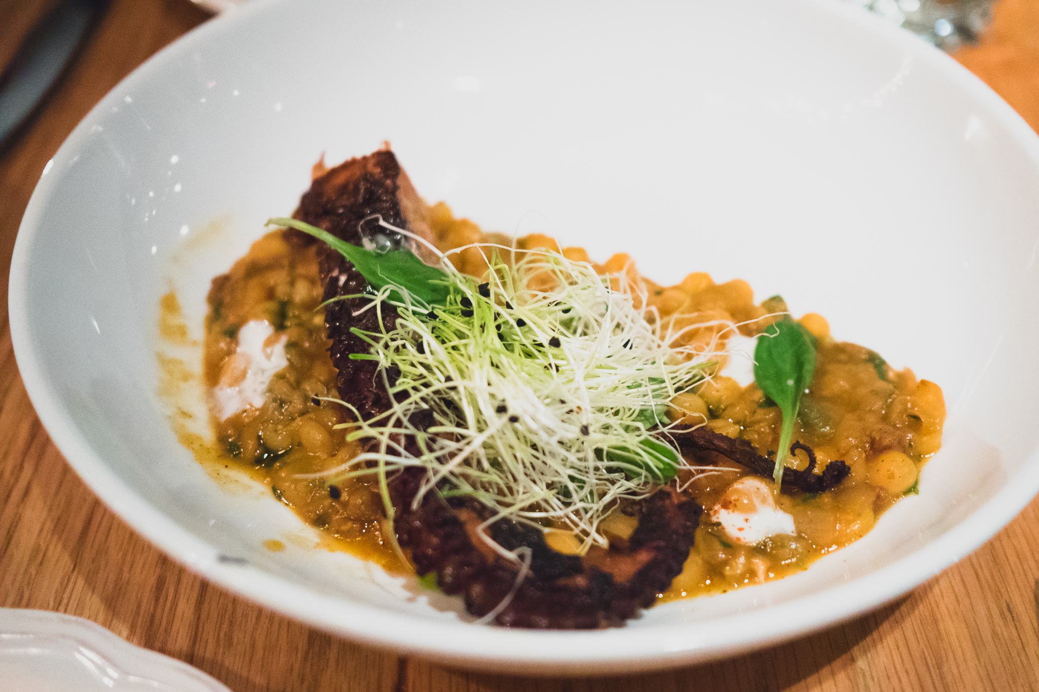 pulpo with alberjones, chorizo and crema.