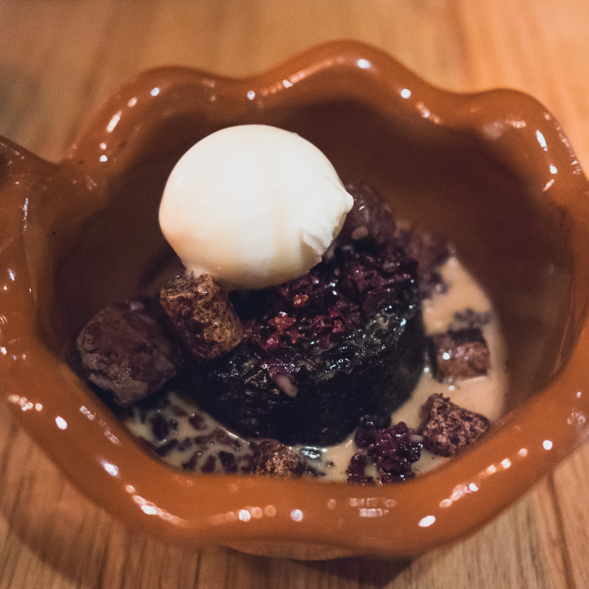 abuelita hot chocolate : ancho-chocolate cake, alpaco ganache, candied cocao nib, milk ice cream, abuelita broth.