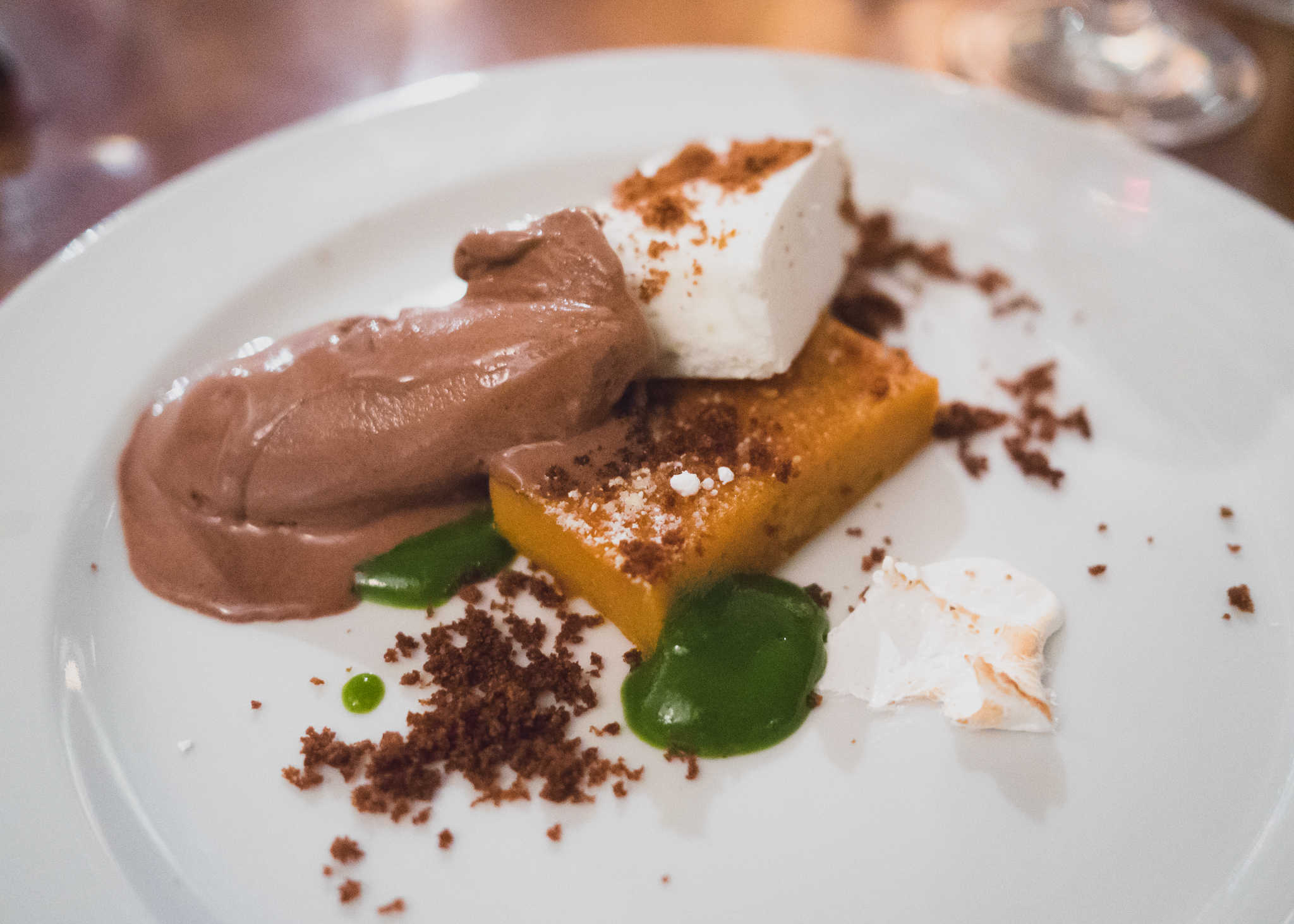 black garlic ice cream, mango and cilantro gel, sweet potato cake, frozen coconut foam.