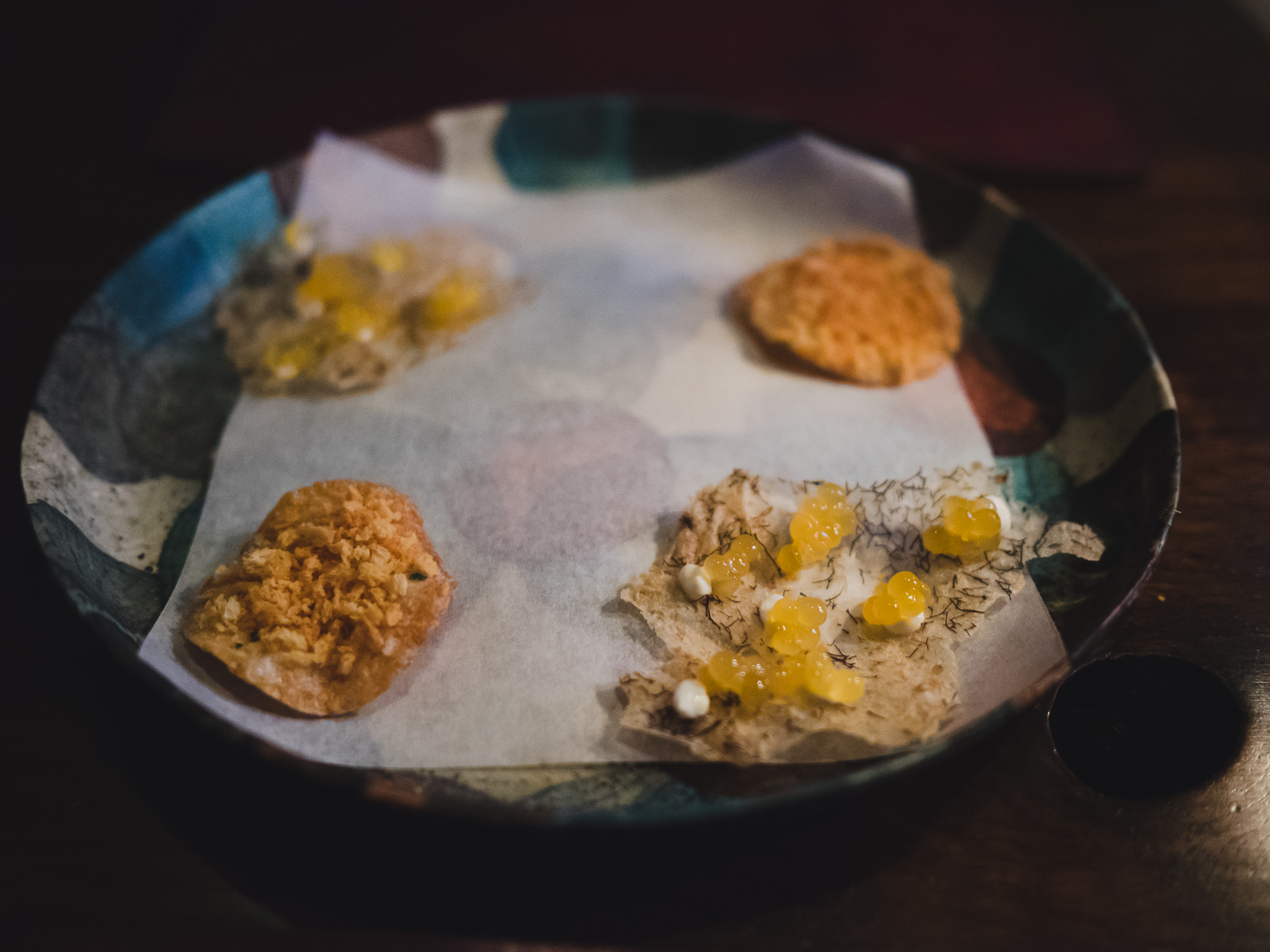 snacks 05. rutabaga and smoked cod roe; 04. oats, trout roe and sea truffle.