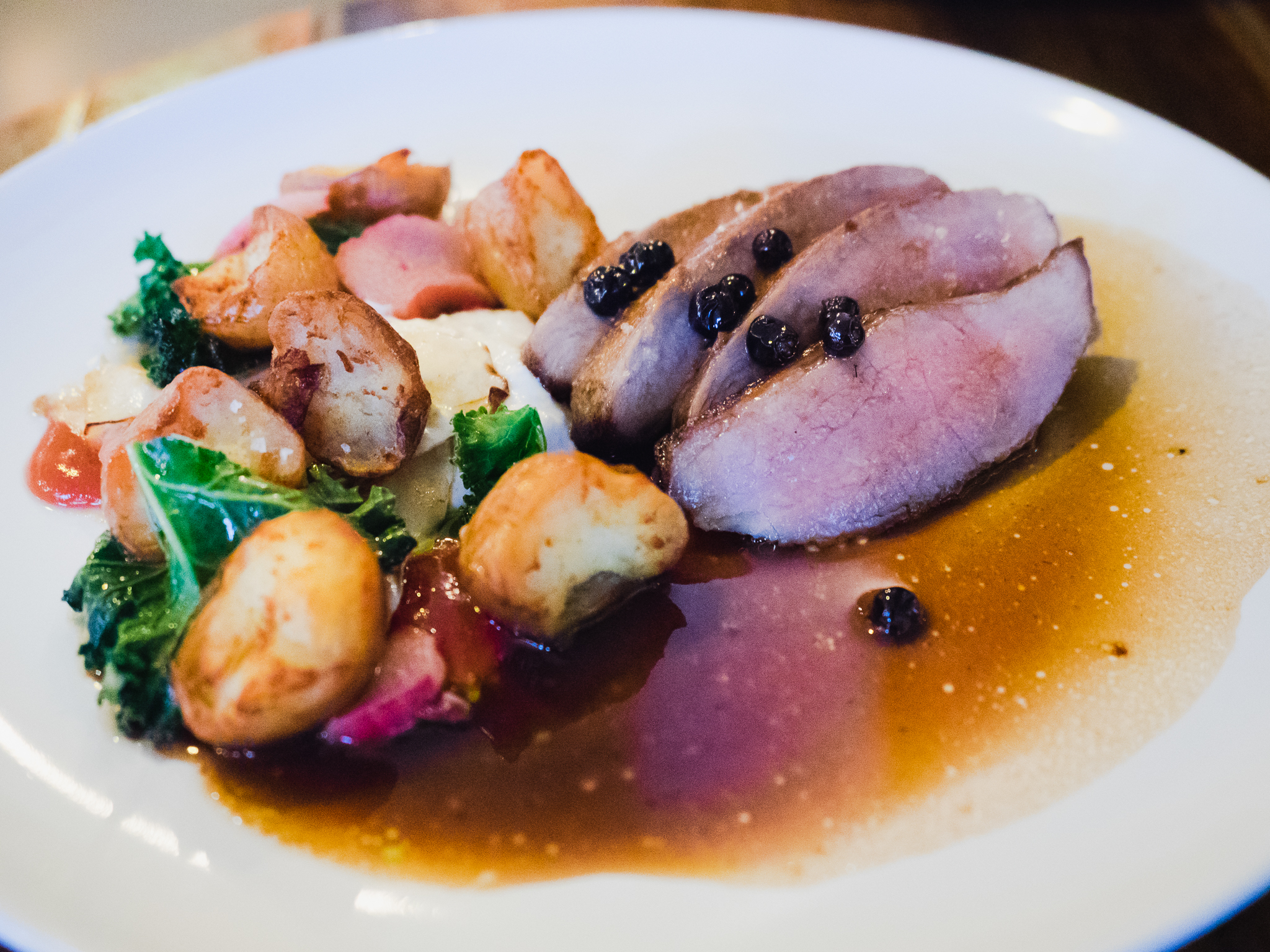 course 6, icelandic menu. lamb, potatoes, arctic thyme, rhubarb jam, winter kale and crowberry sauce.