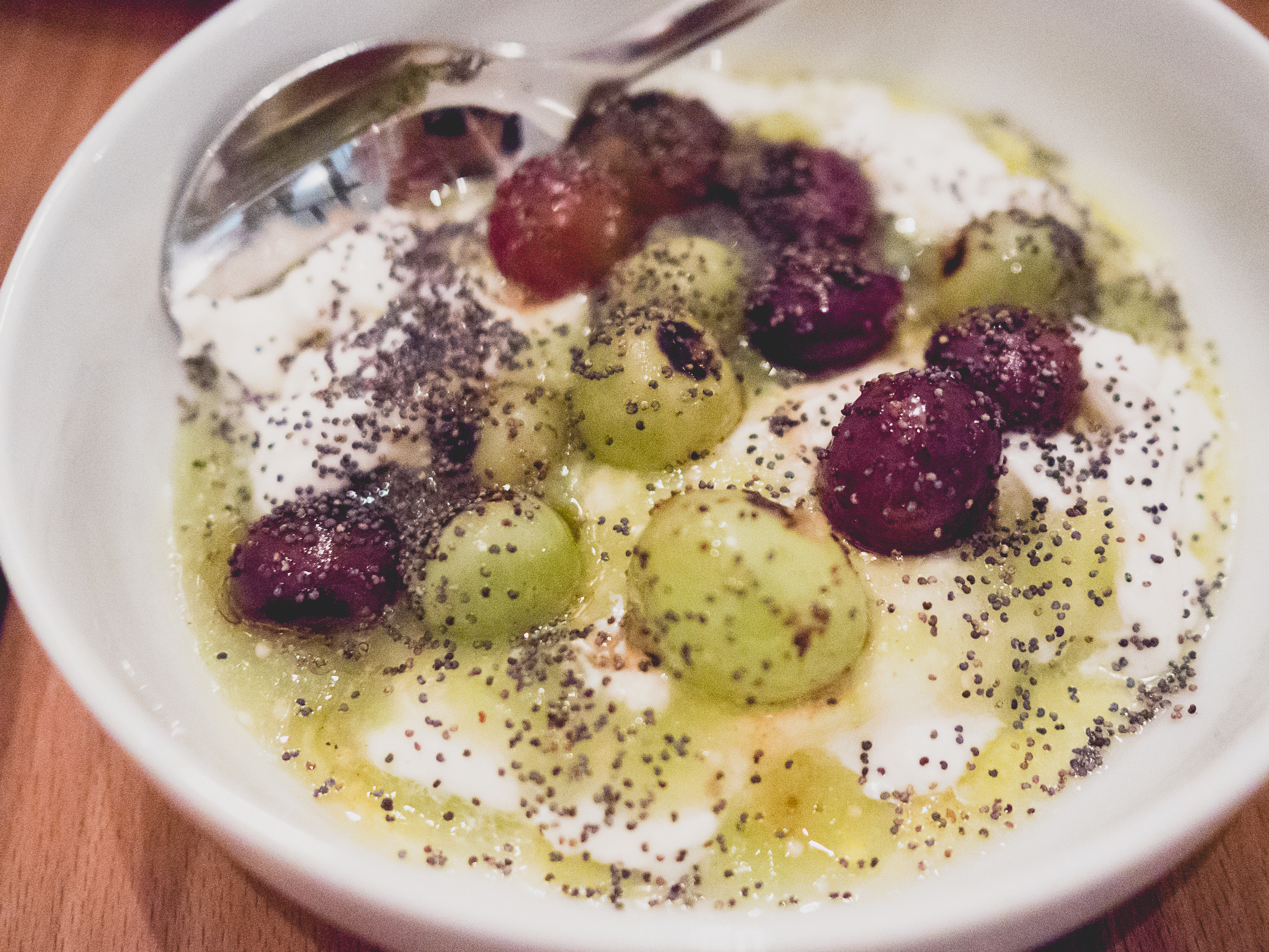 burrata, raymundo's tomatillo salsa, grape, poppyseed.