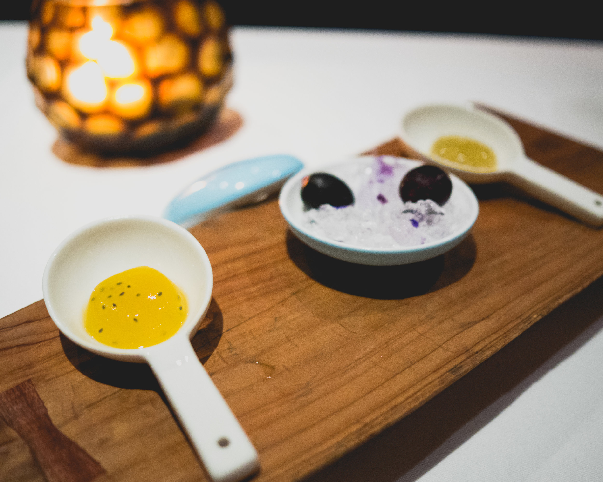 amuse: pisco sour "shot" with passion fruit and basil seeds; frozen grape soaked with pisco.