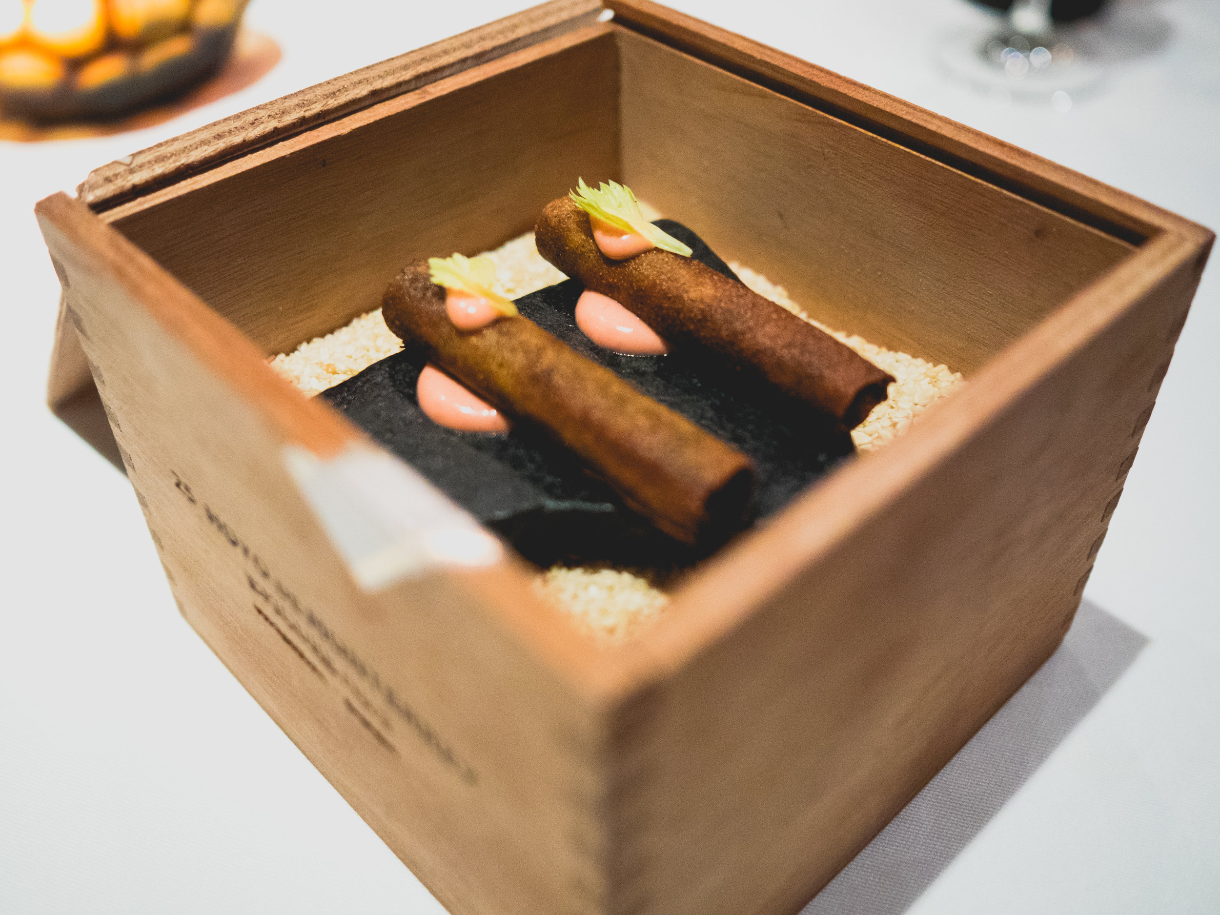 amuse: wagyu beef "cigar", ume mayo, celery leaf.