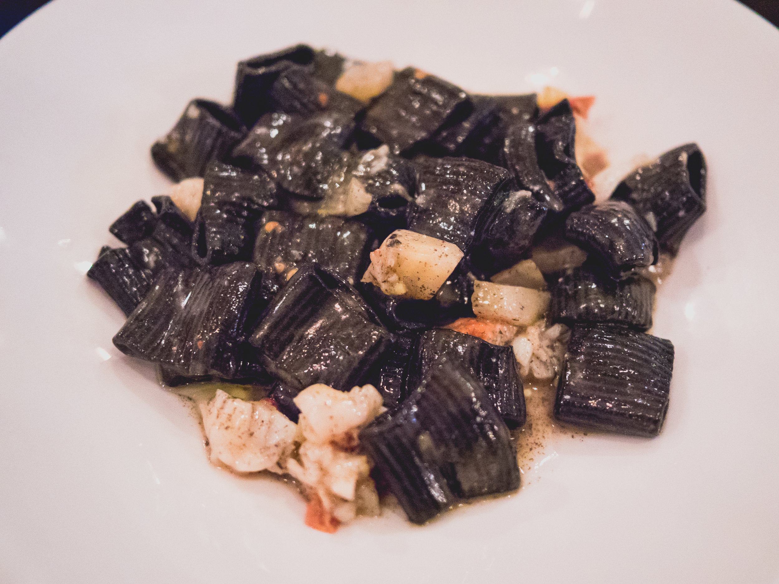 squid ink bombolotti , main lobster, fennel, meyer lemon, truffle butter.