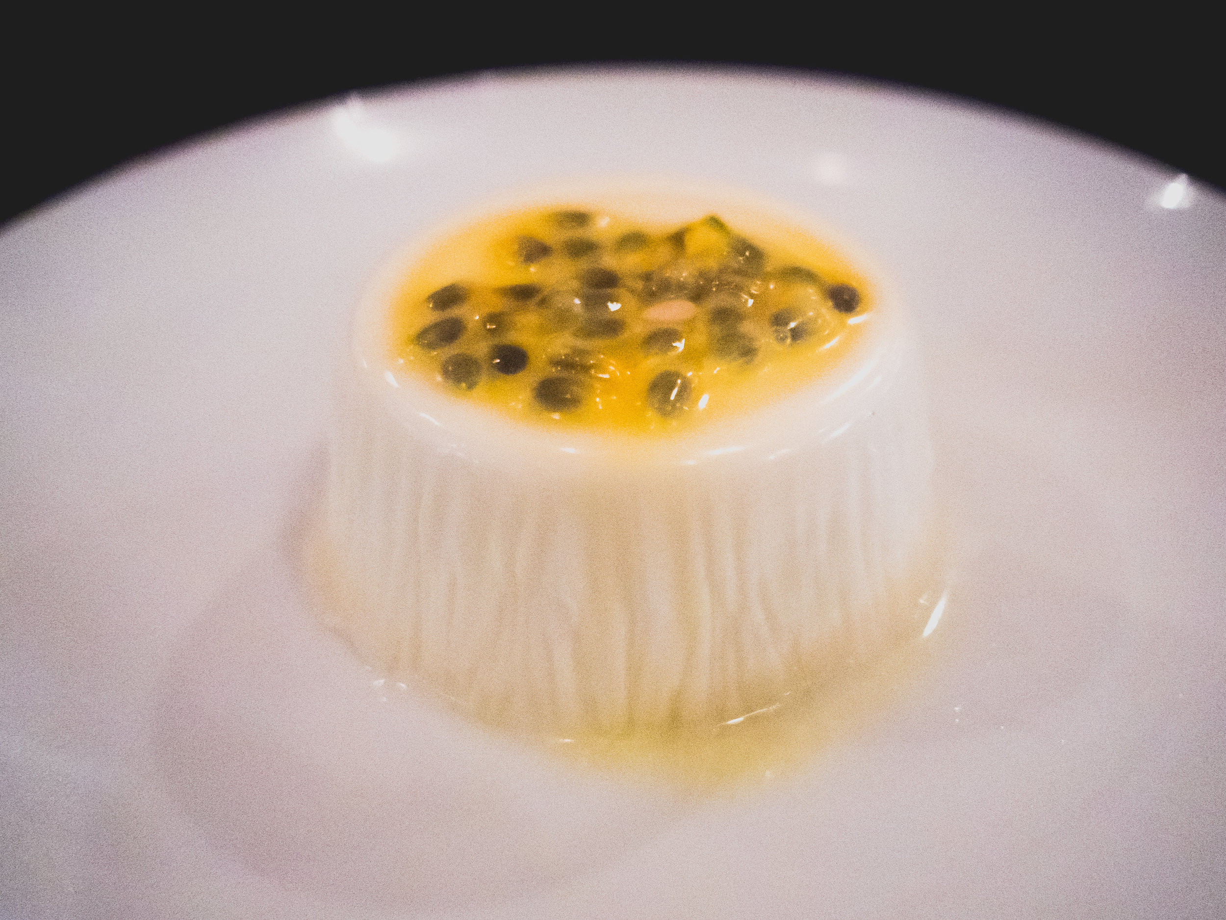 meyer lemon panna cotta , passion fruit, vanilla.