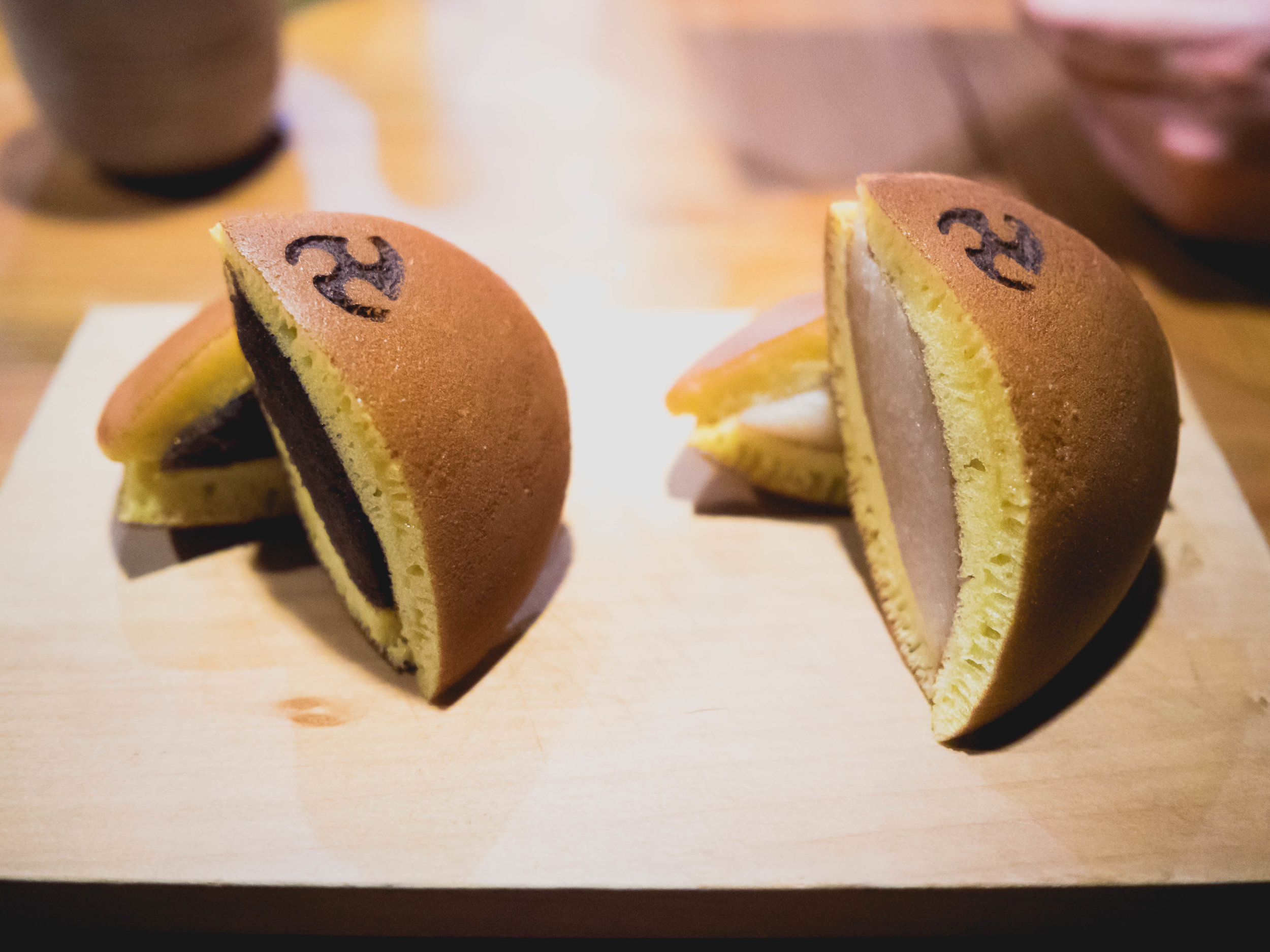 dorayaki : mini pancakes filled with red, white bean.