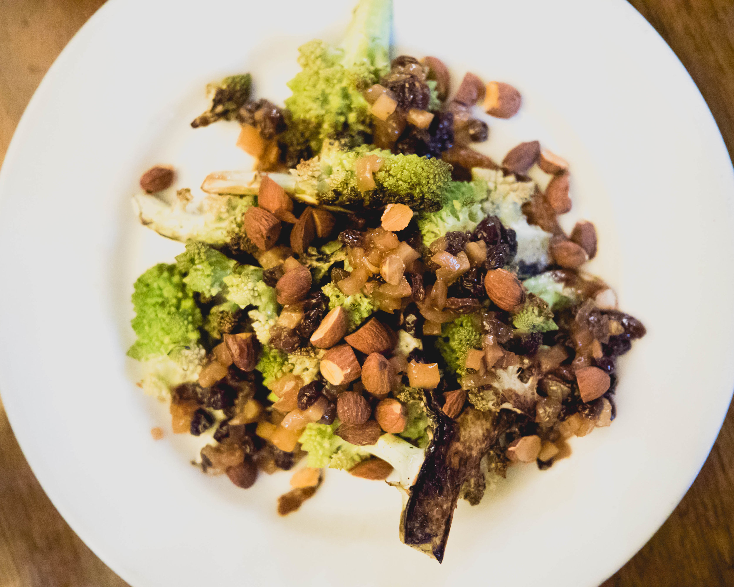 roasted romanesco, mole, pickled currants, almonds.