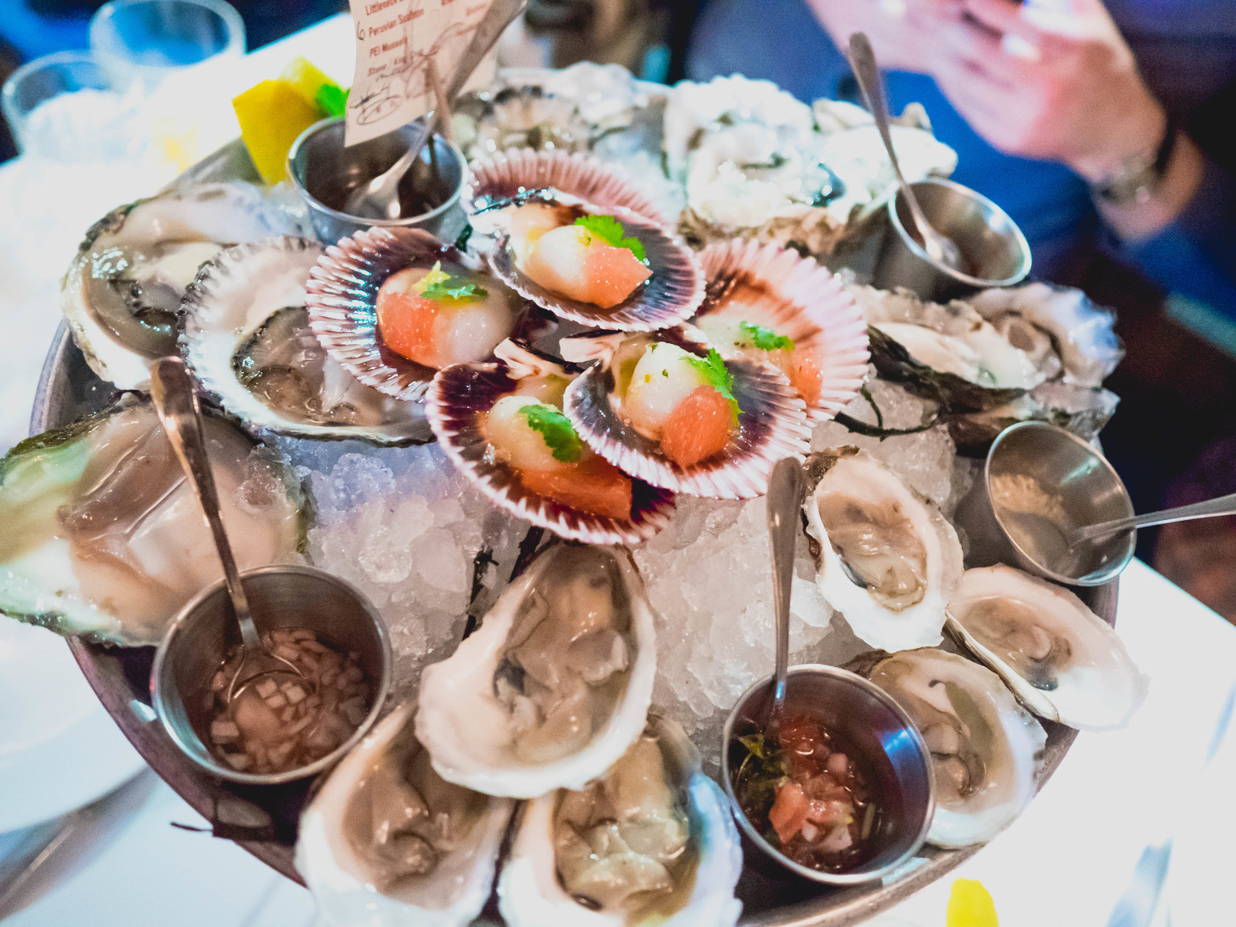 peruvian scallops and all the oysters .