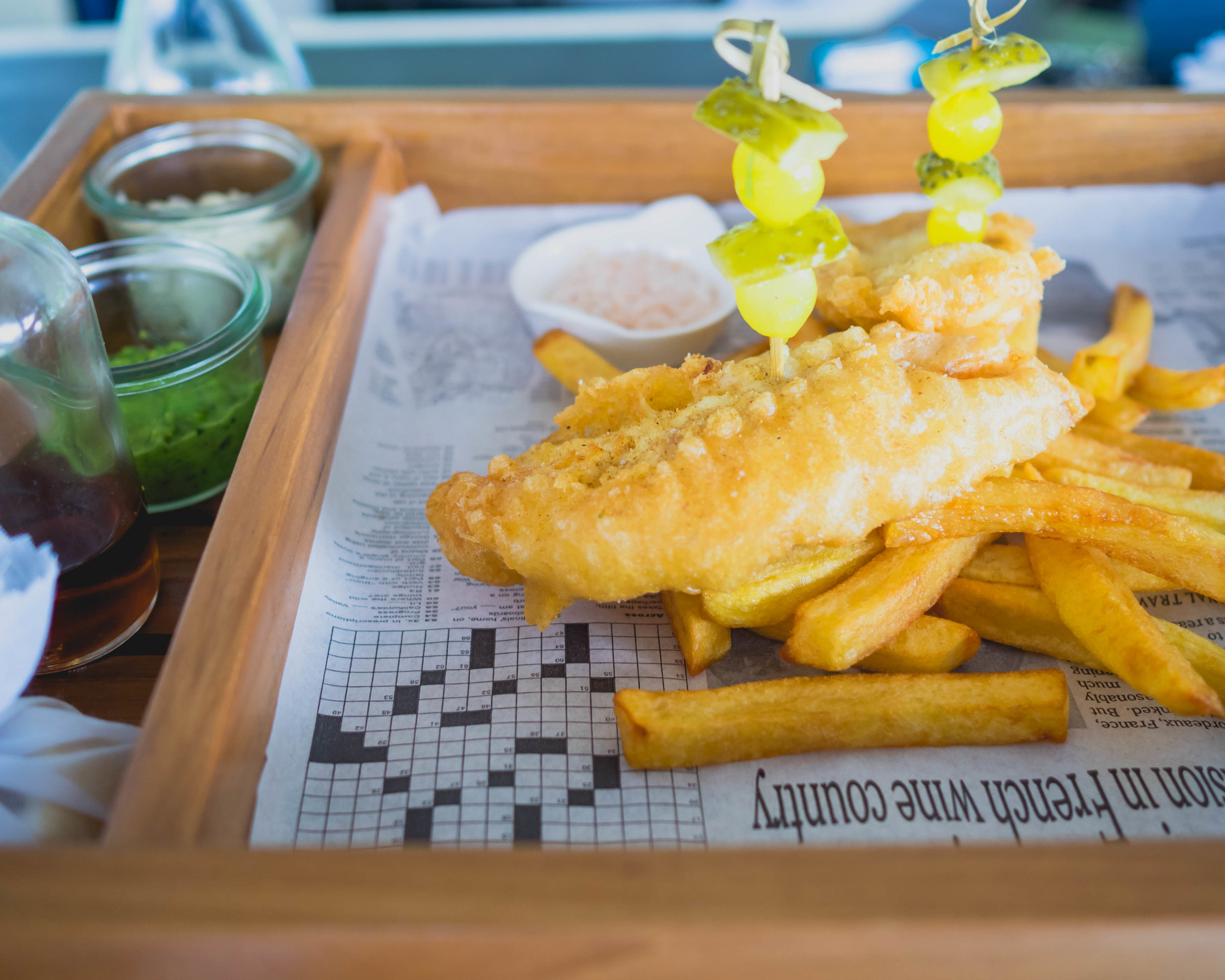 fish and chips at veli bar: beer battered snapper, homemade chips, mush peas, pickles, lemon, tartar sauce, malt vinegar.