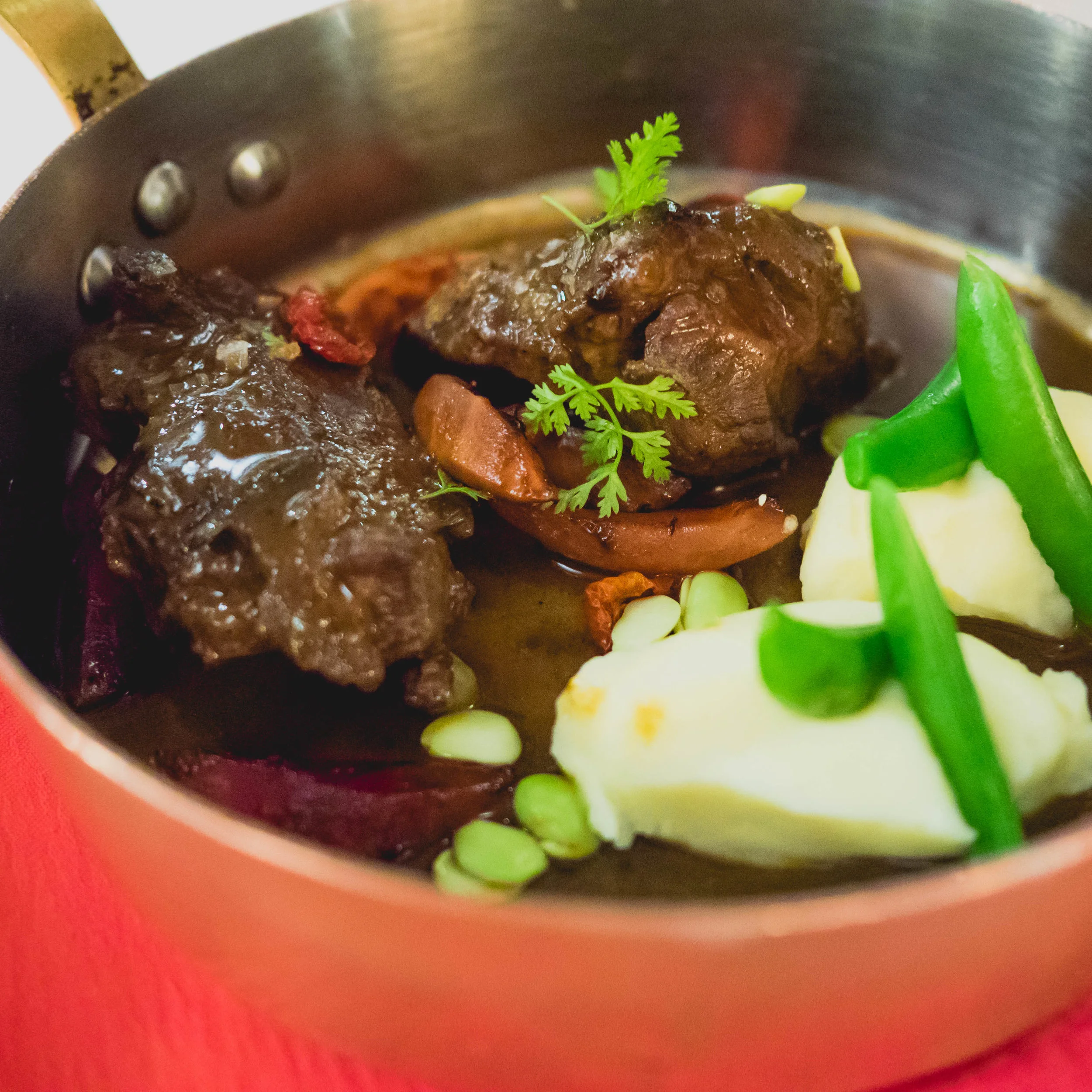 truffle veal cheeks at allegria: 8-hour braised veal cheeks, creamy mashed potato, braised jus.