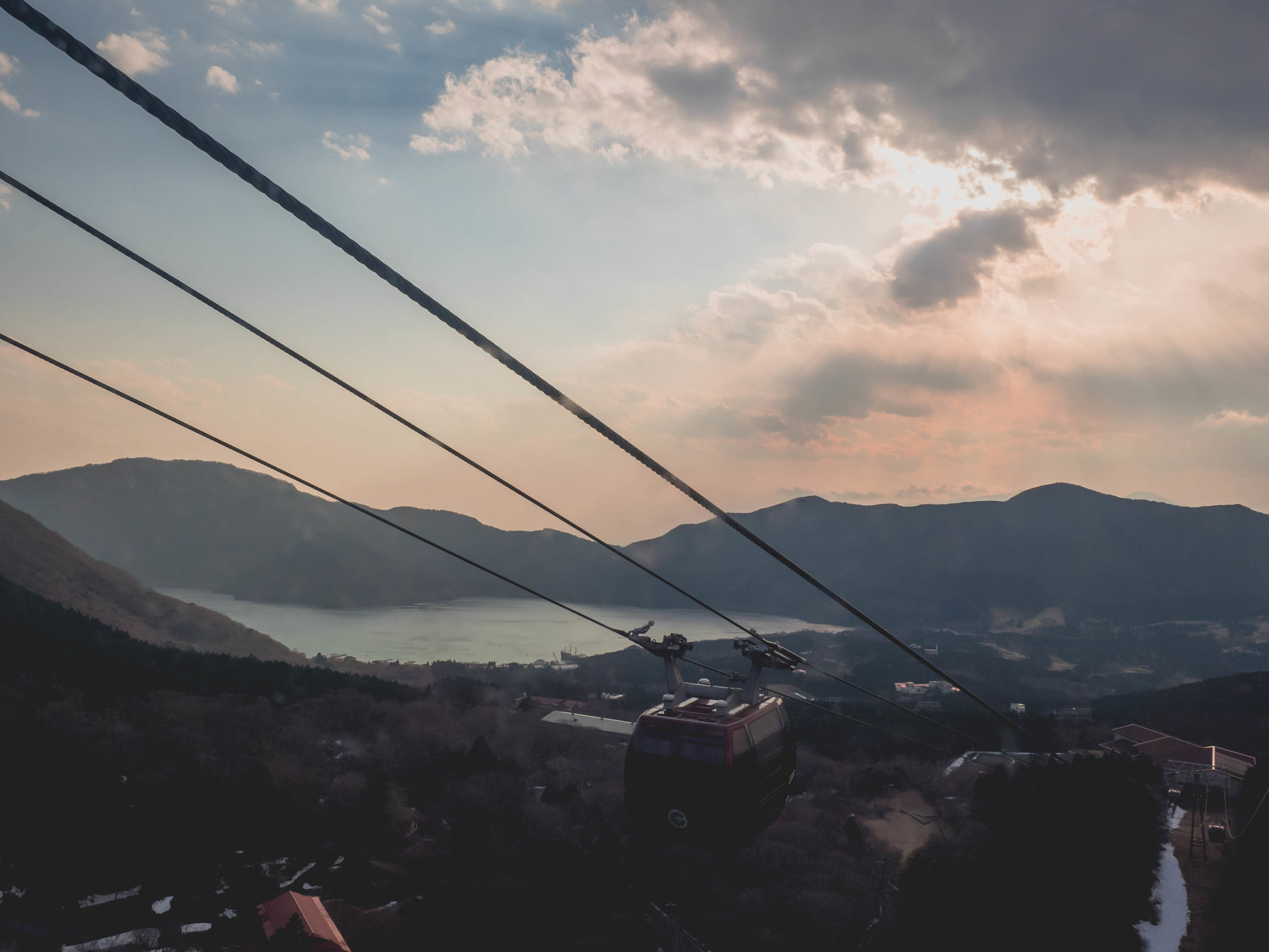 lake ashi from hakone ropeway at sunset.