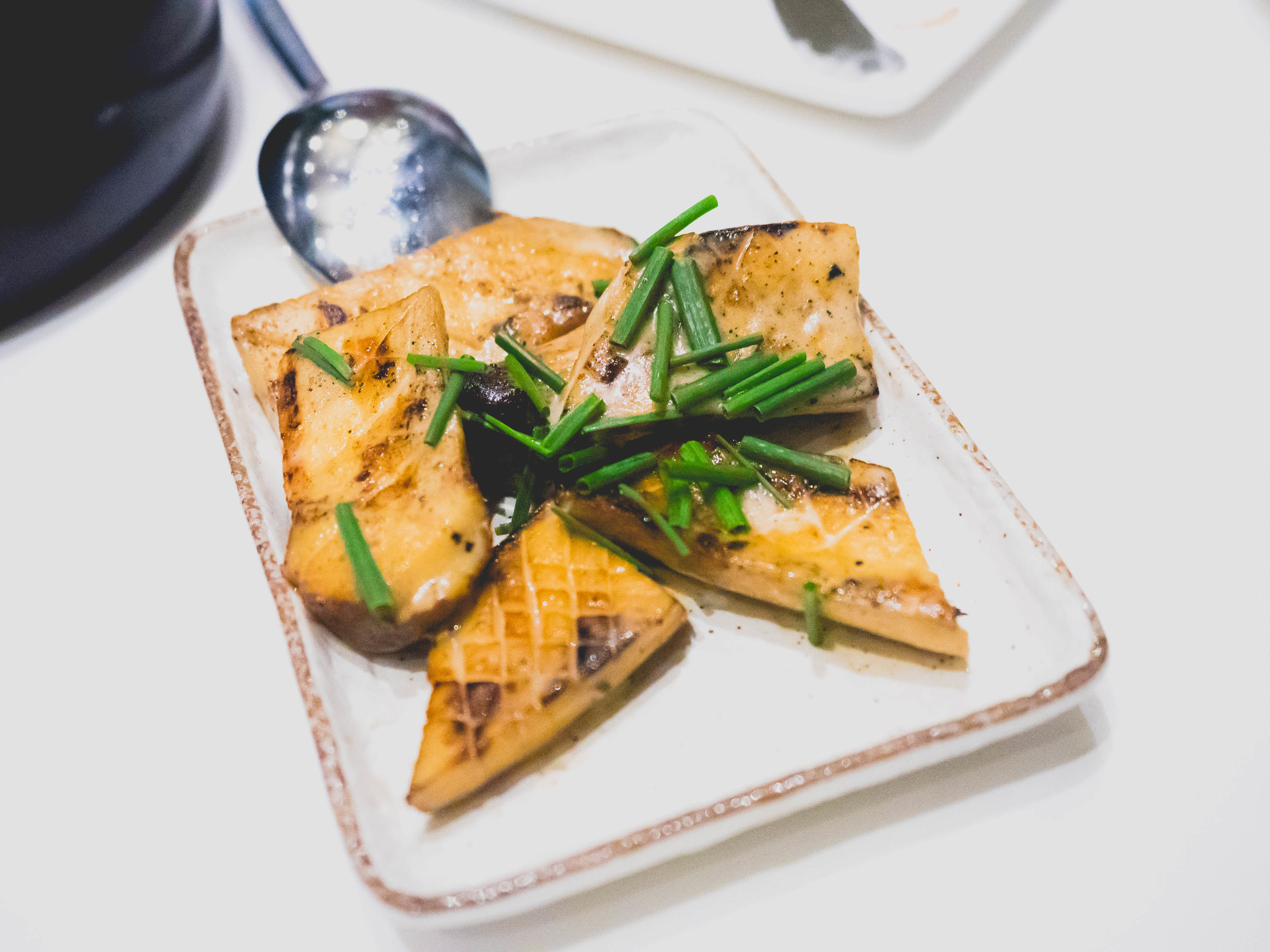 eryngi mushrooms , roasted garlic, thyme, lemon vinaigrette.