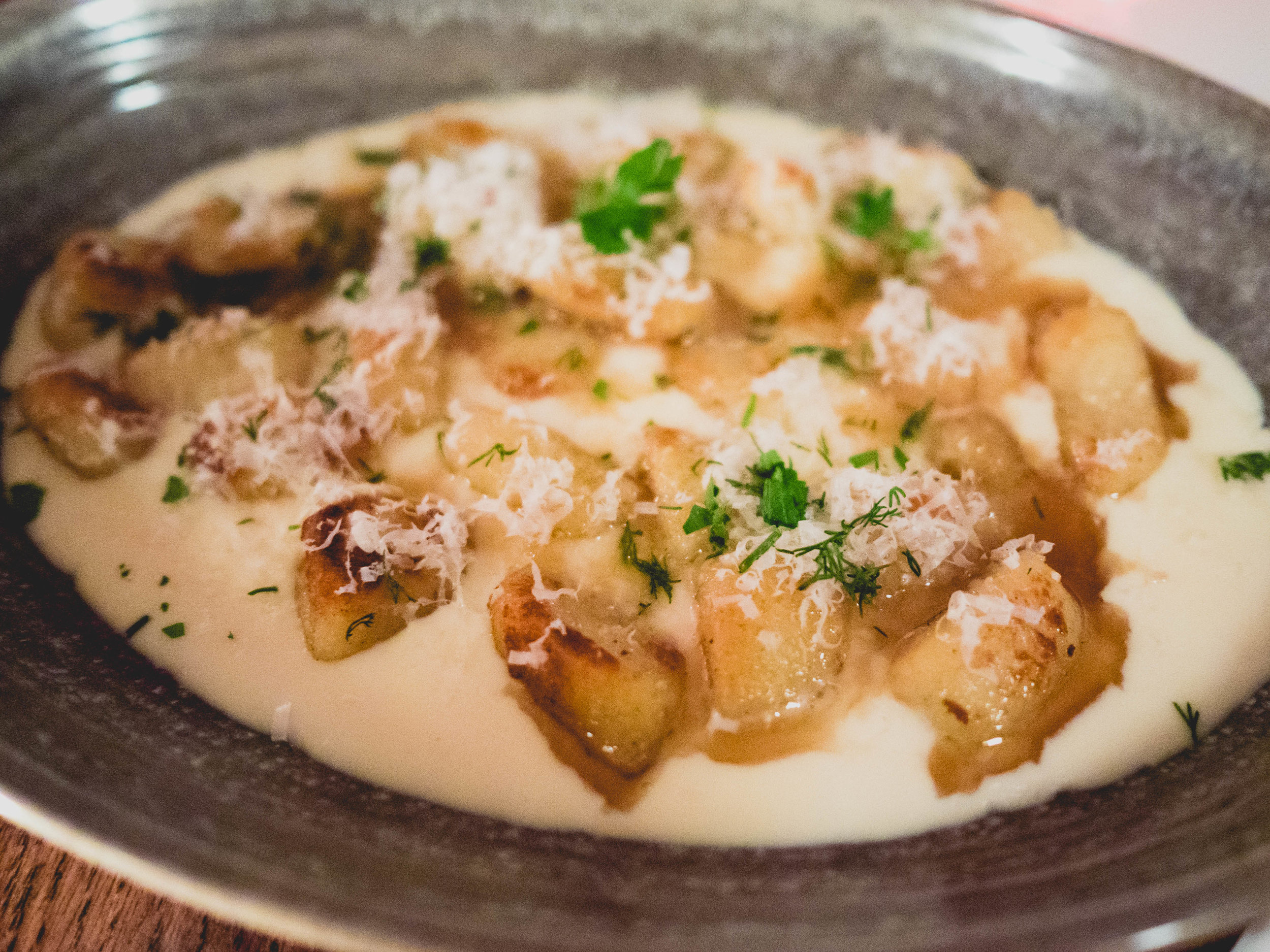 gnocchi , brown butter corn sauce, dill, lemon, parmesan.
