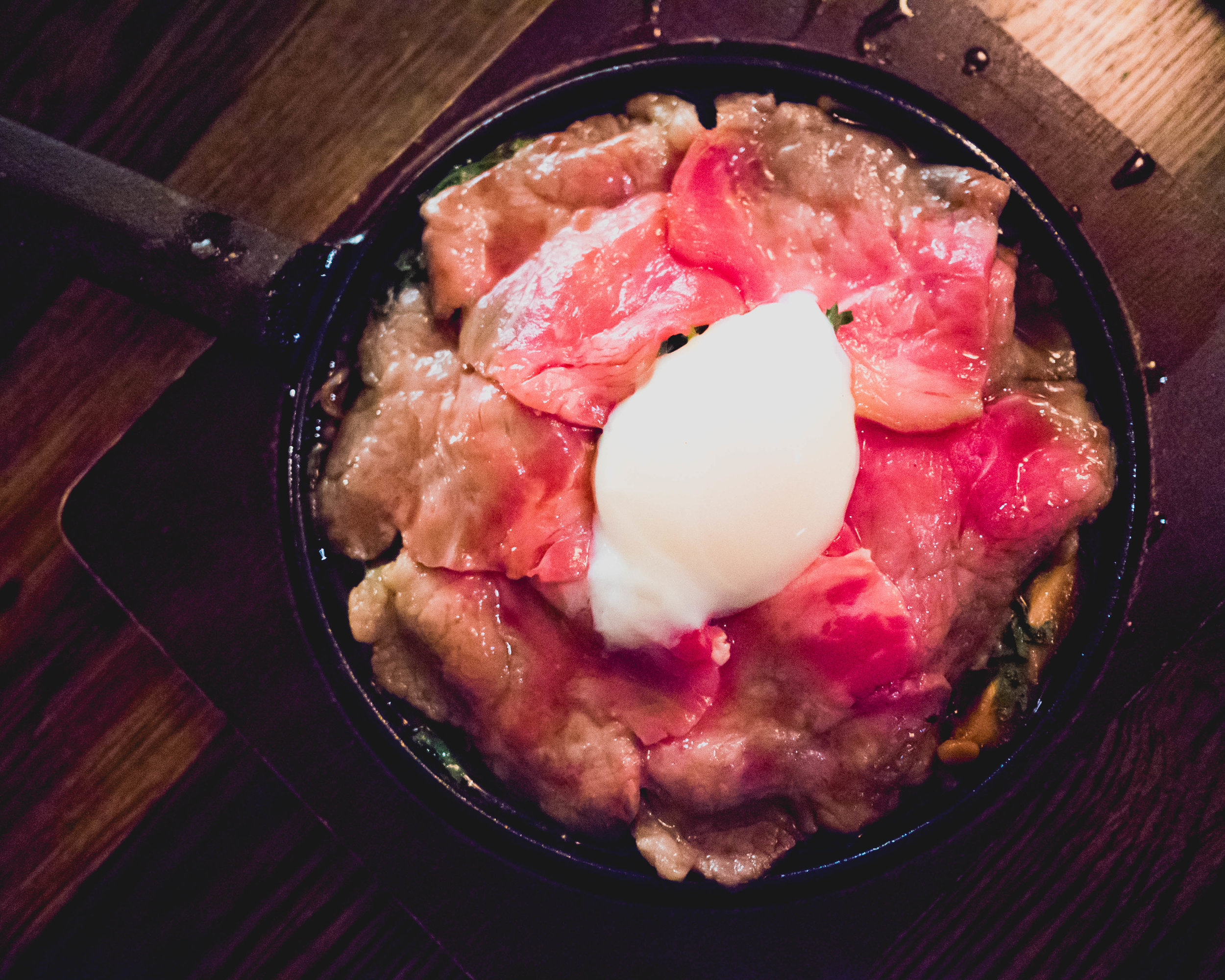 sukiyaki : new york strip steak, forest mushrooms, chrysanthemum leaves, soft egg.