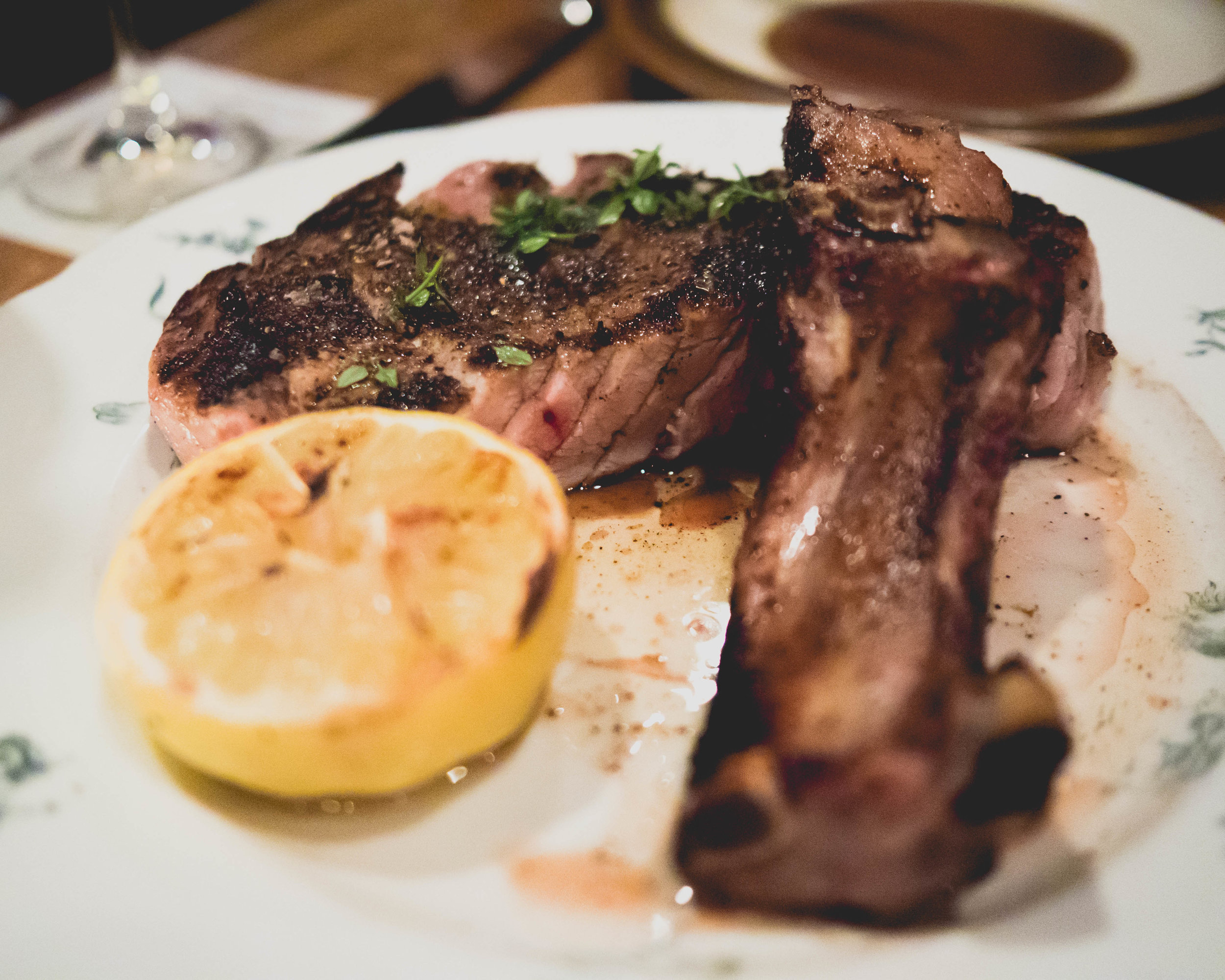 mushroom crusted pork chop, smoked lard, wood herbs.
