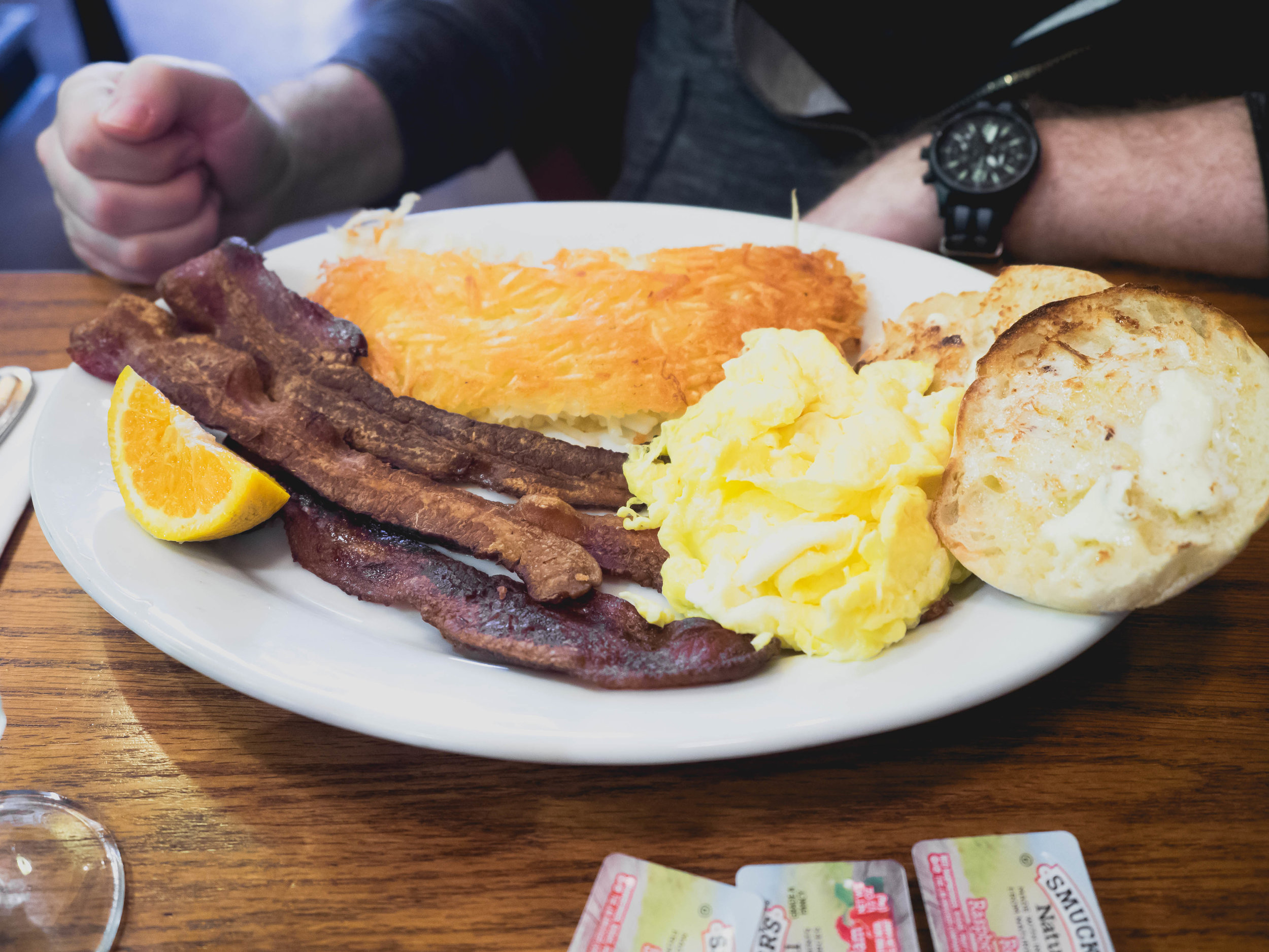 breakfast special : two eggs, bacon, hash browns, english muffin.