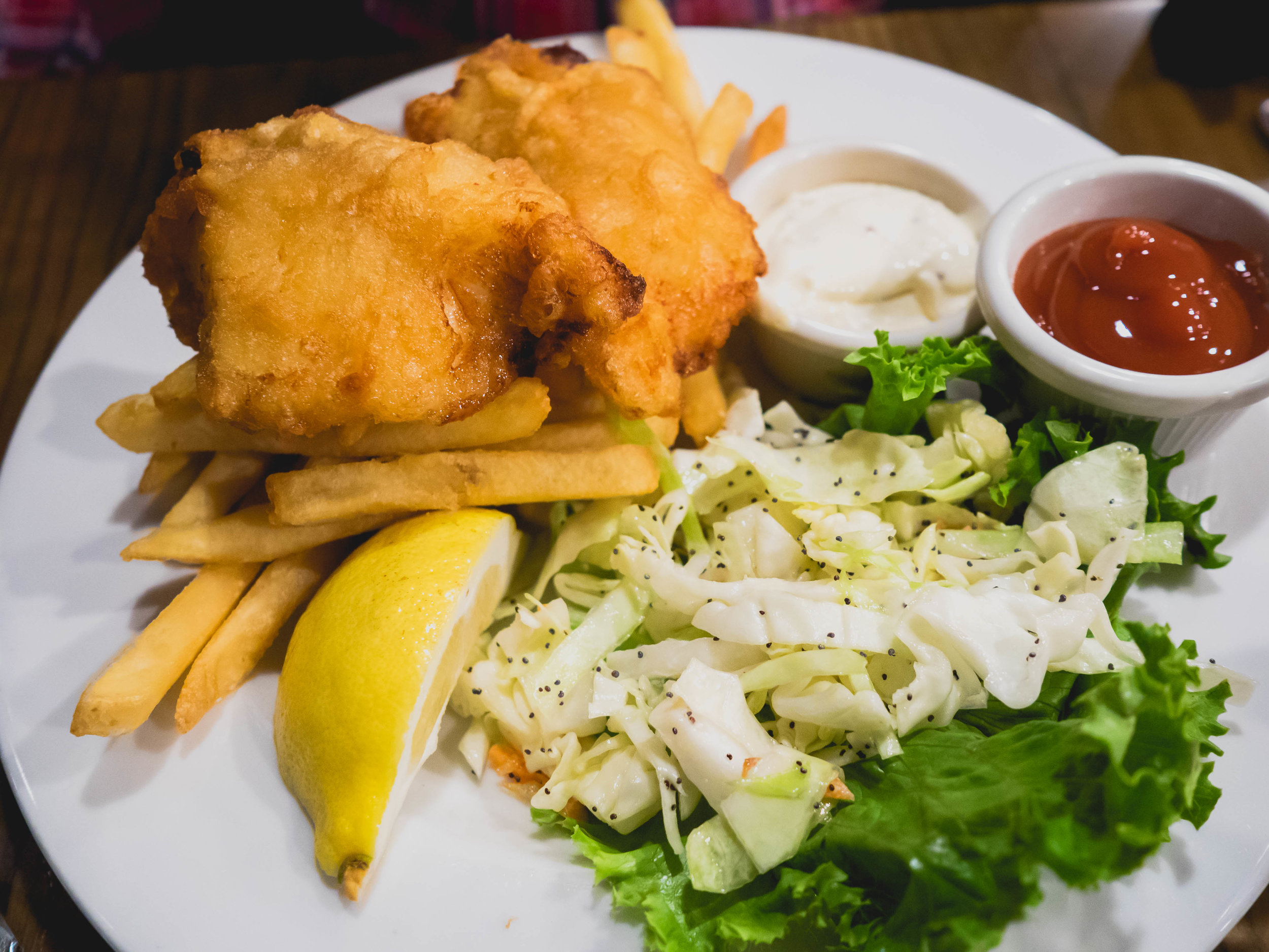 fish and chips : bar hop ale battered pacific cod, citrus tartar sauce, coleslaw, french fries.