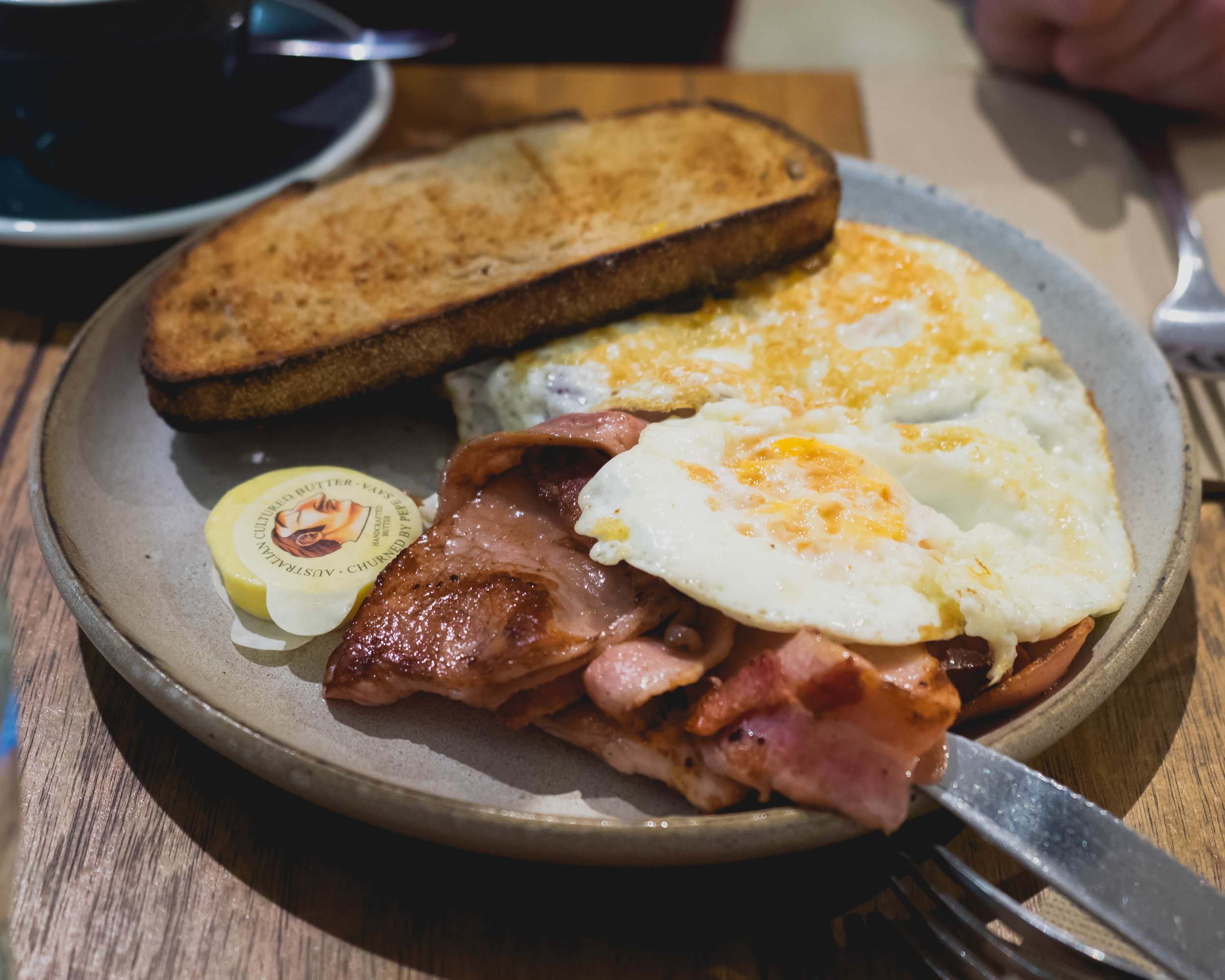 eggs on sourdough with bacon speck.