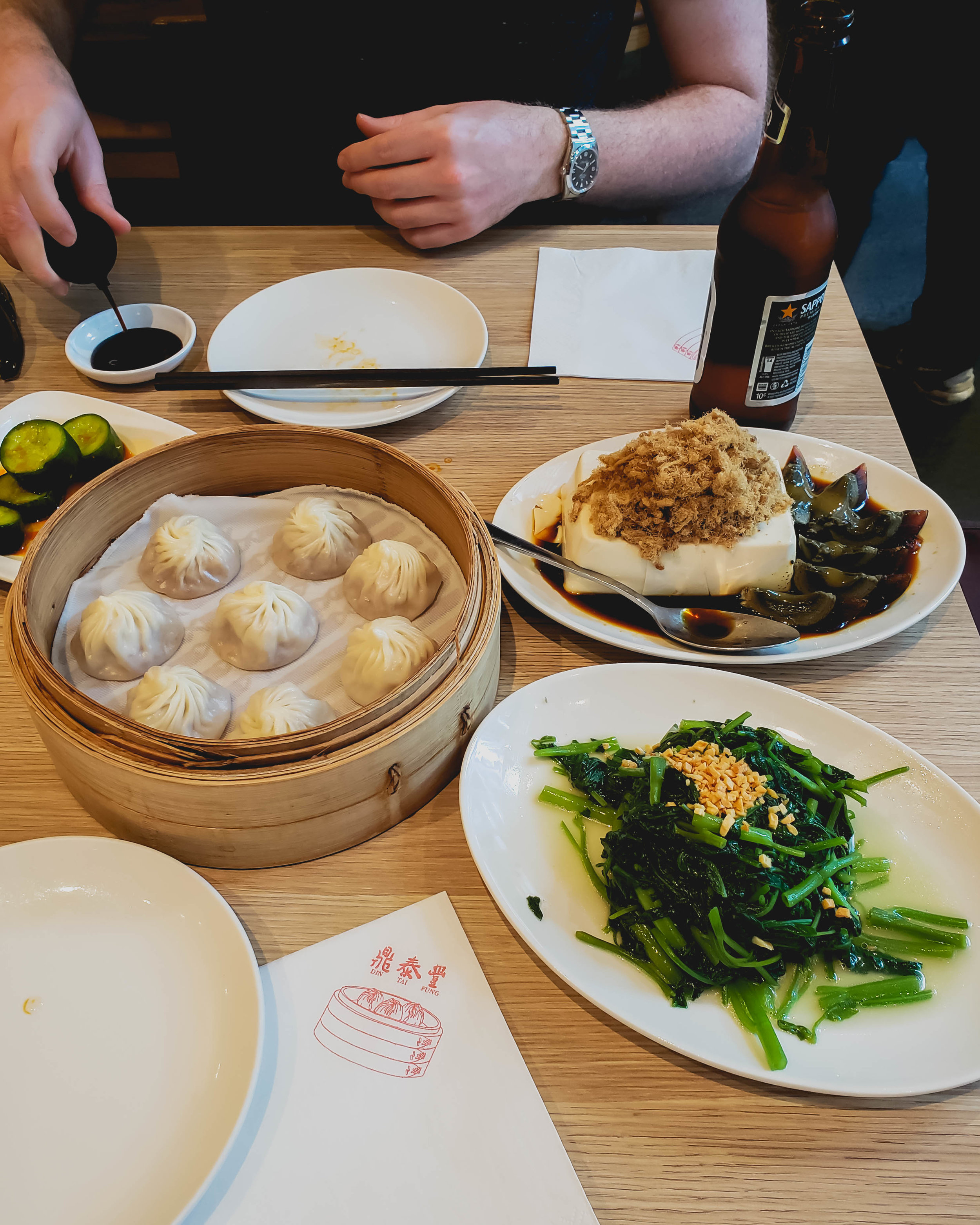 cucumbers; xiao long bao; silken tofu with pork floss and century egg, water spinach .